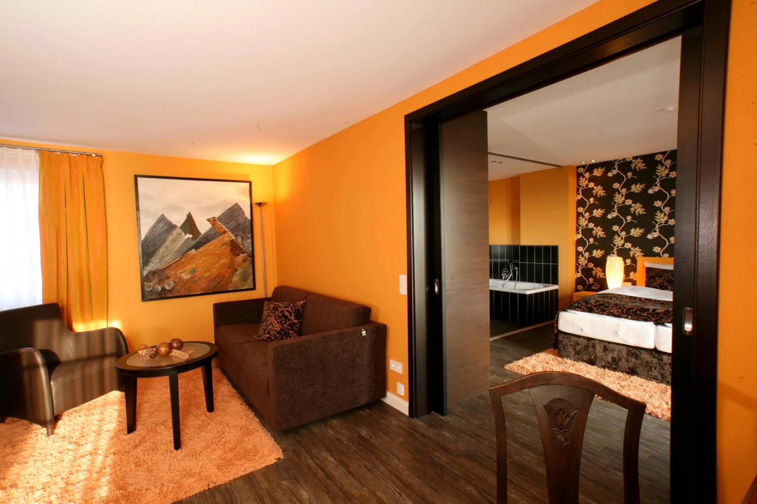 Living room, Bed in Strand-Hotel Seenelke