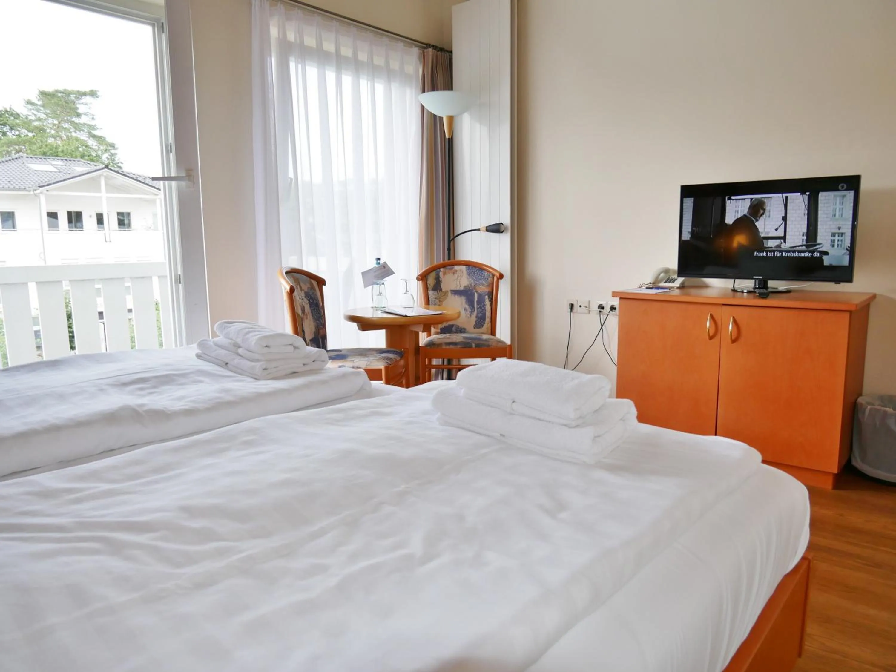 Photo of the whole room, Bed in R&R Hotel Strandallee