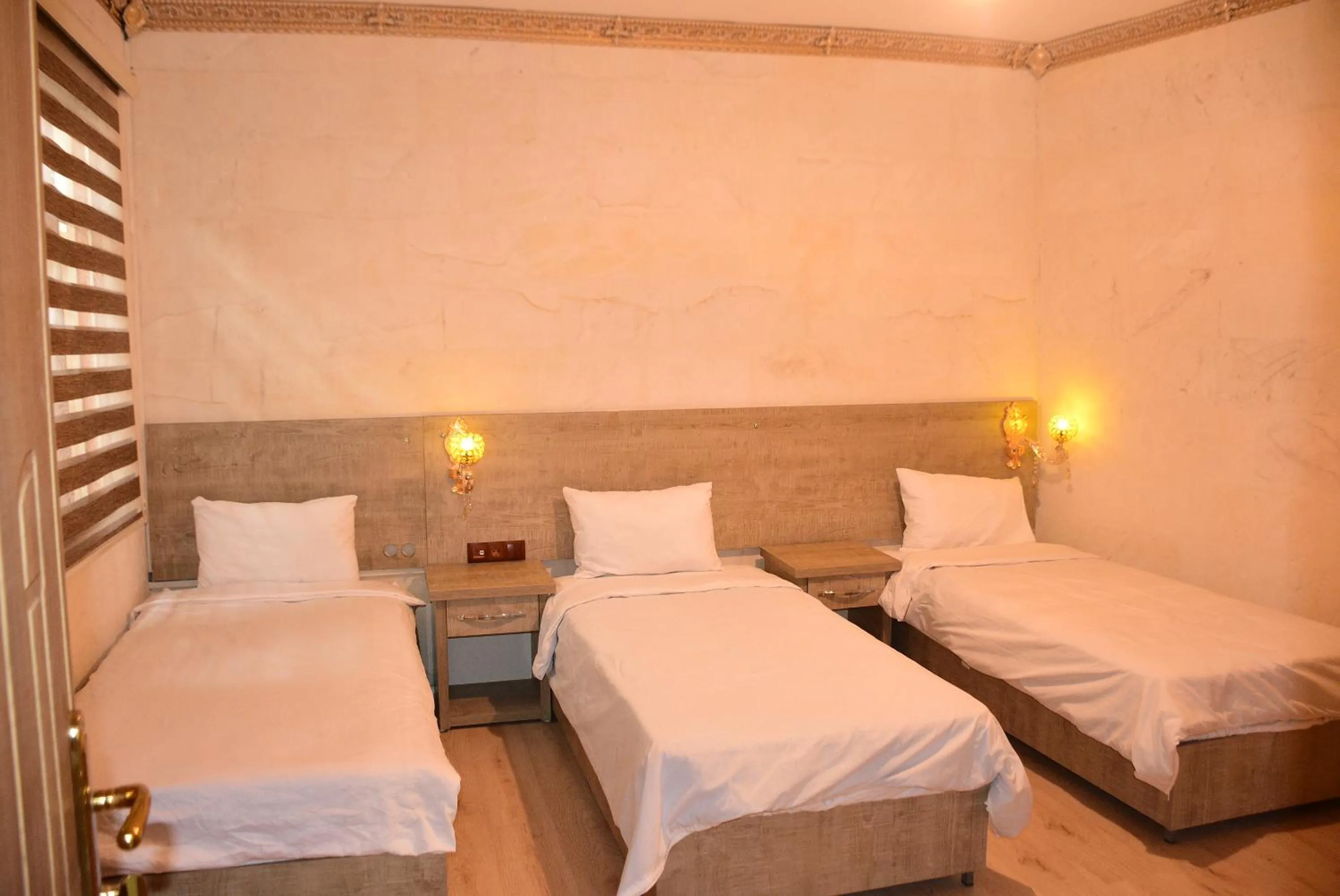 Bed in CİHANGİR KONAĞI BUTİK OTEL