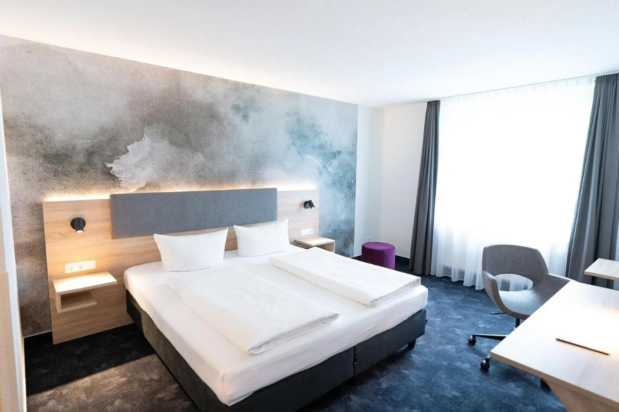 Photo of the whole room, Bed in Taste Hotel Jettingen