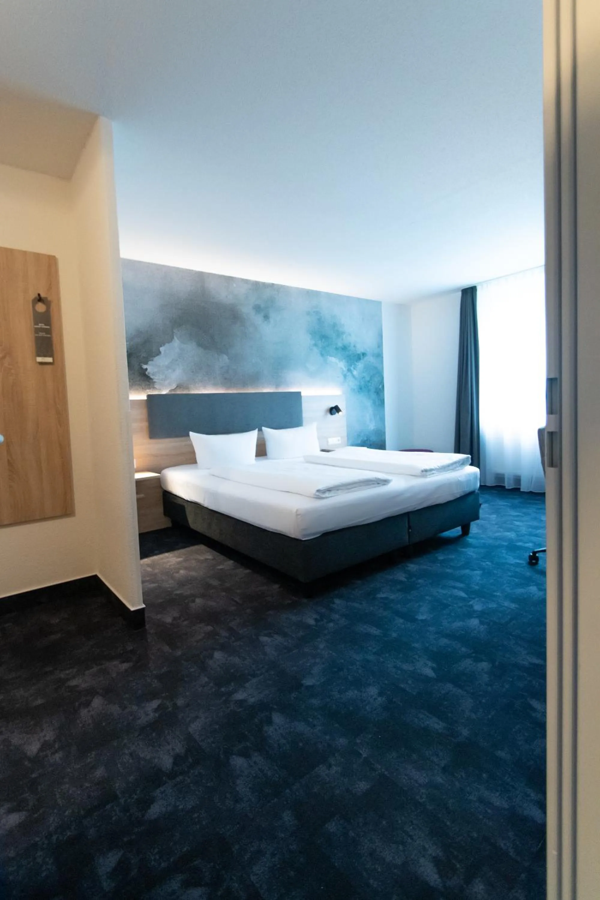 Photo of the whole room, Bed in Taste Hotel Jettingen