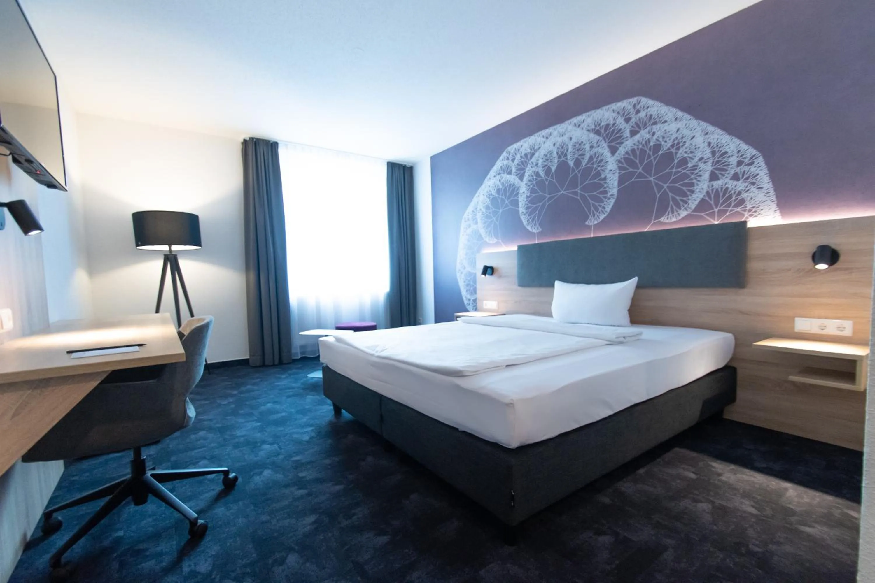 Photo of the whole room, Bed in Taste Hotel Jettingen