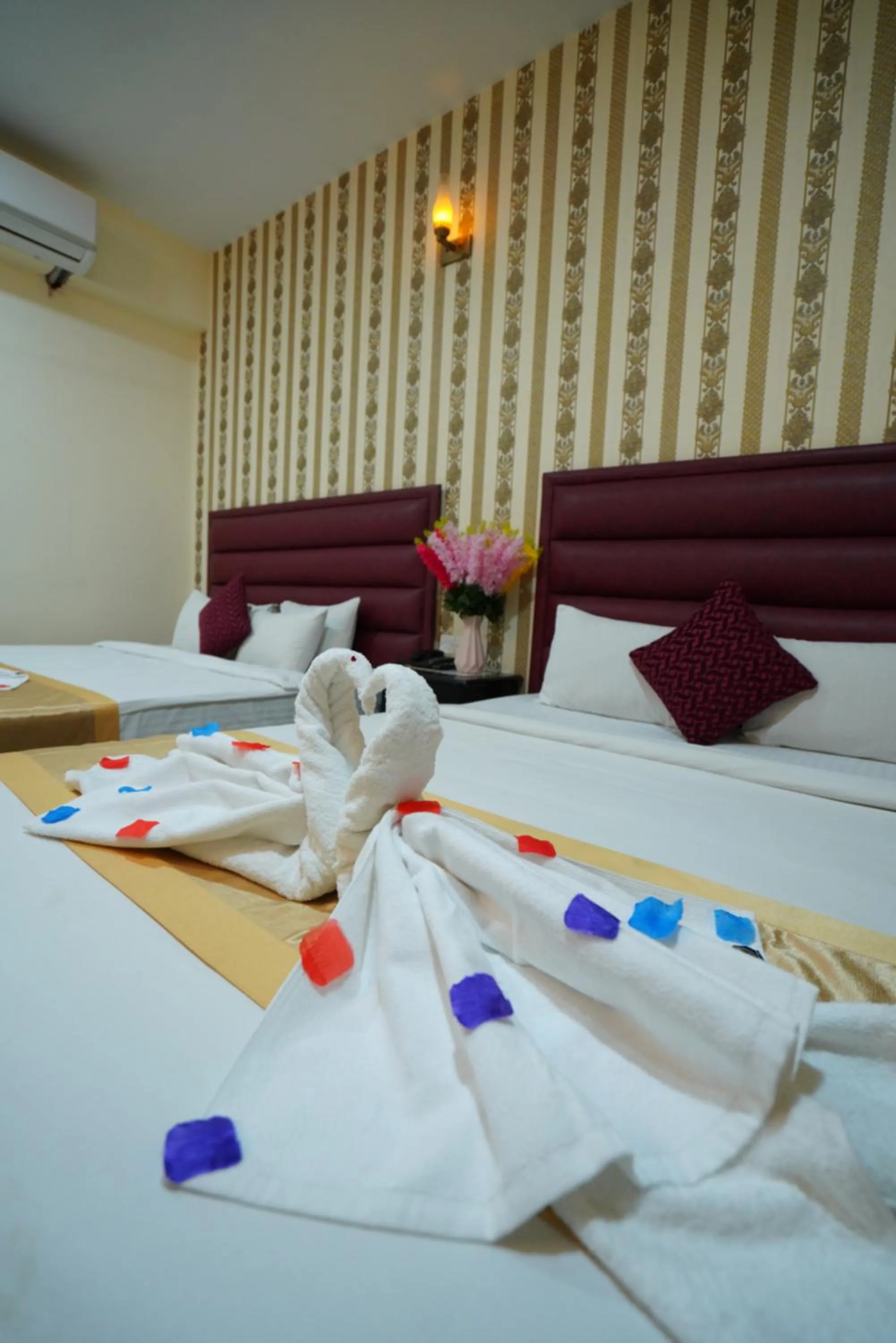 Bed in Grand Mostafa Hotel Ababil