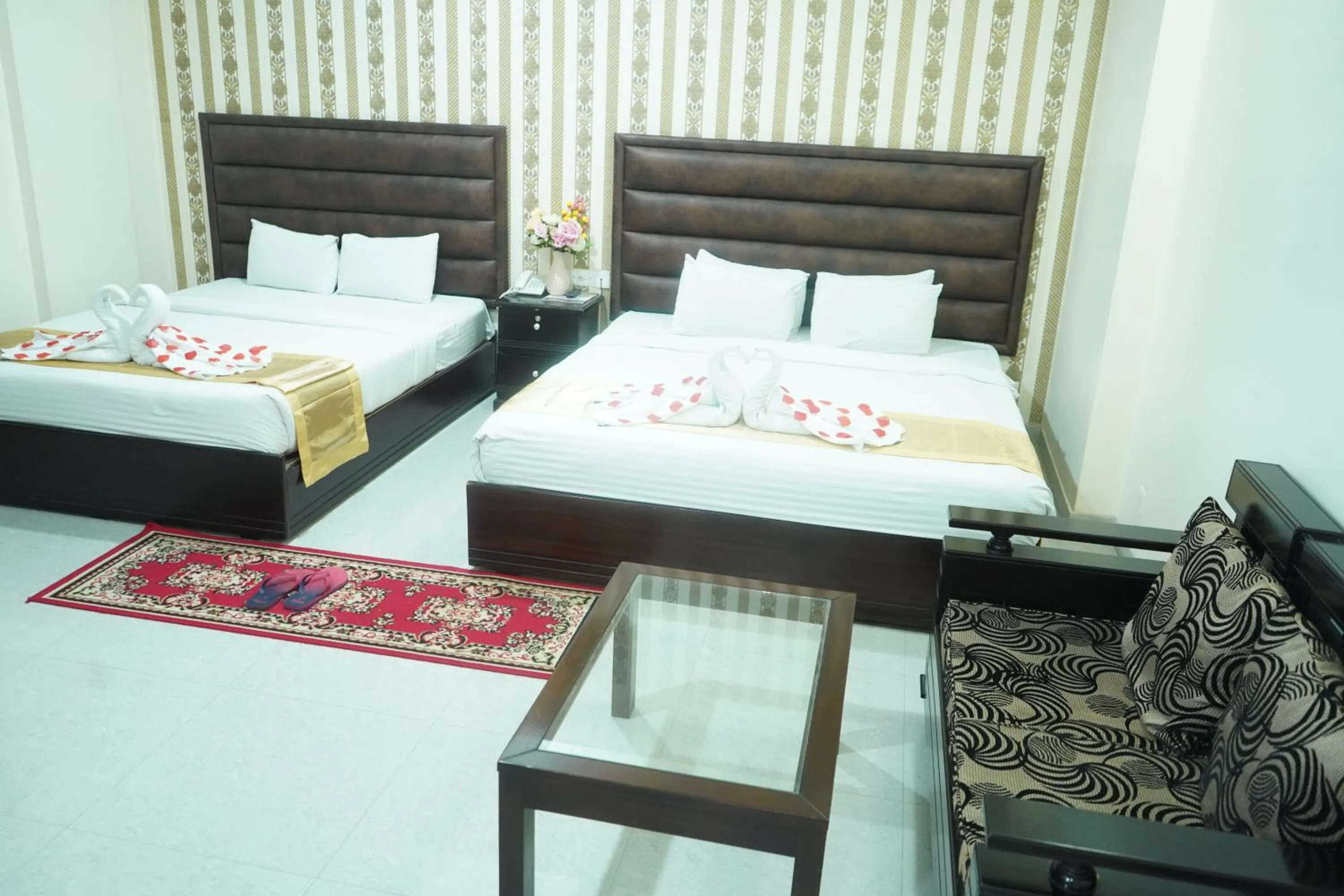 Bed in Grand Mostafa Hotel Ababil