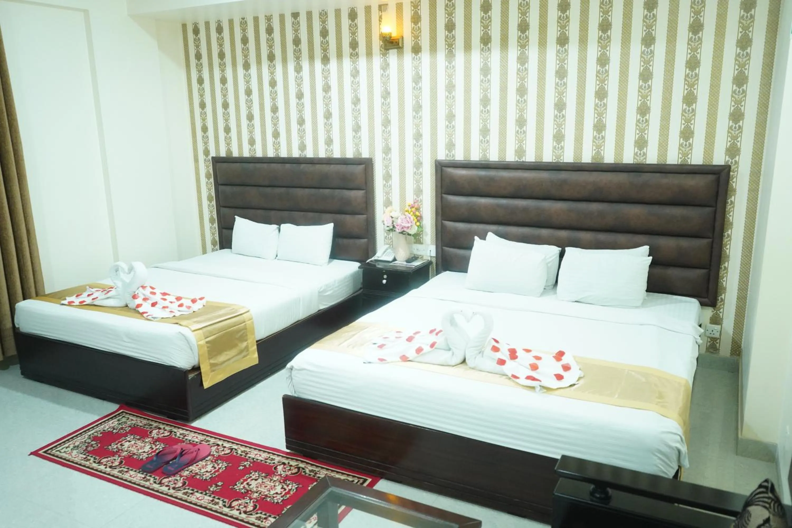 Bed in Grand Mostafa Hotel Ababil