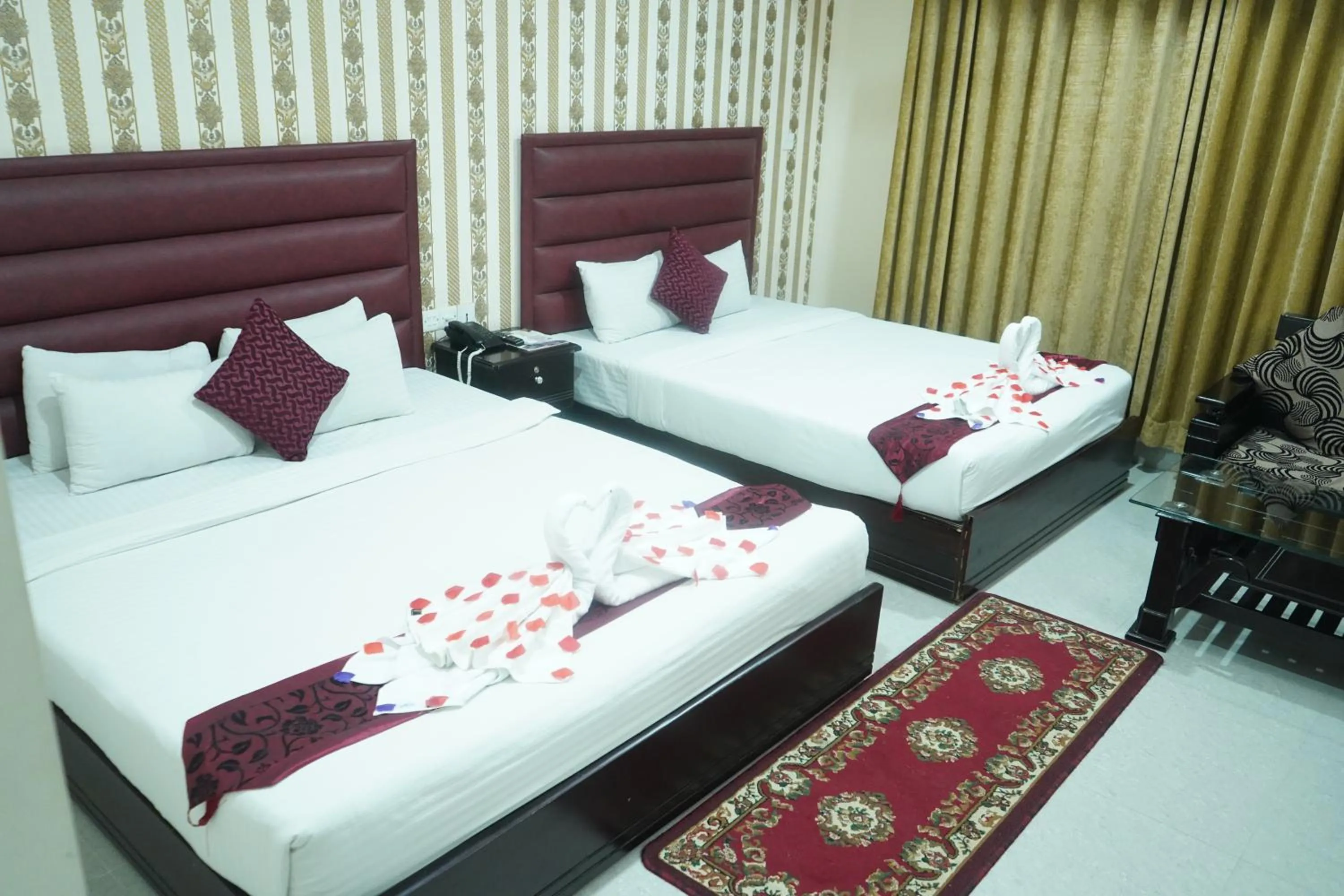 Bed in Grand Mostafa Hotel Ababil