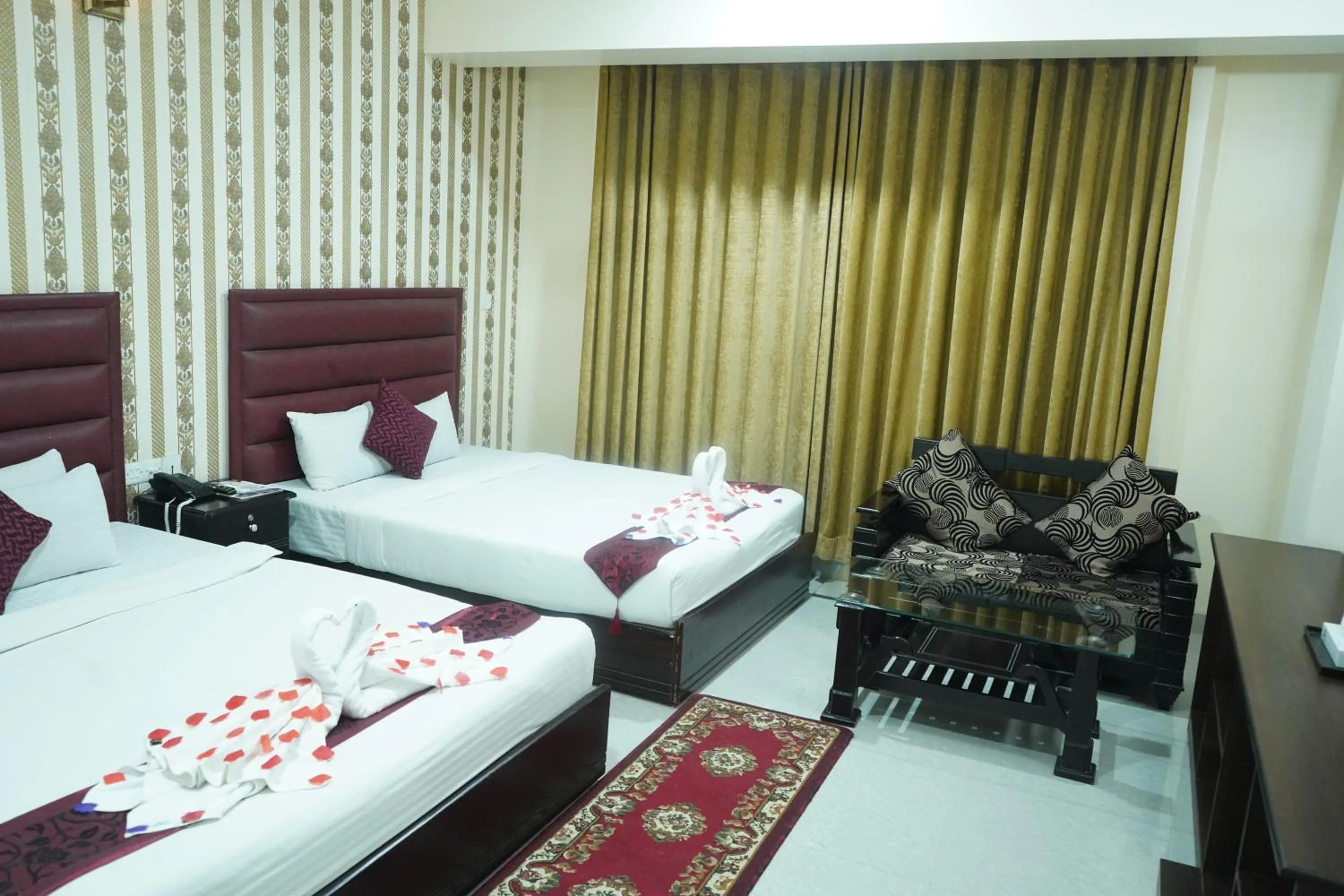 Bed in Grand Mostafa Hotel Ababil