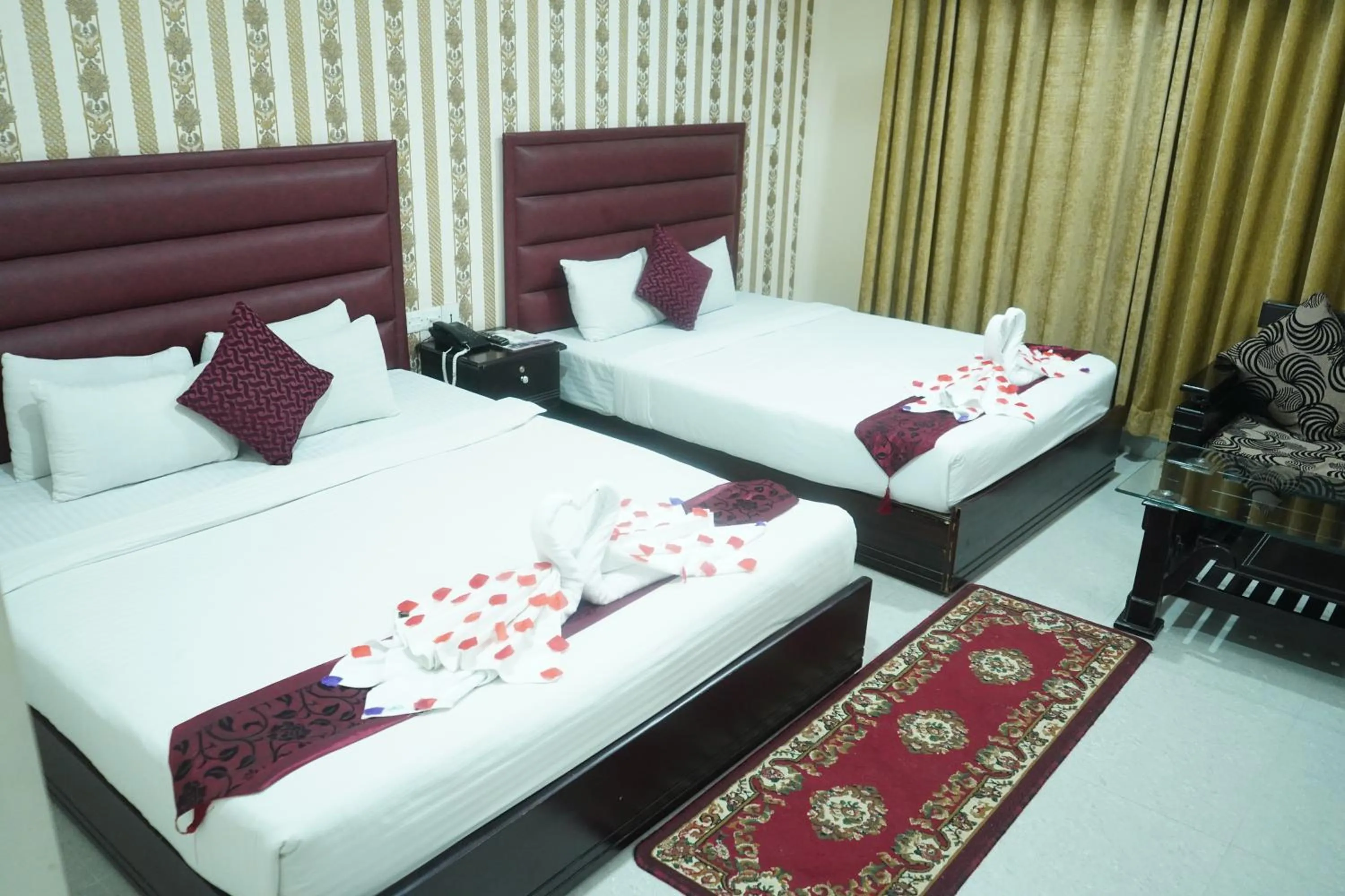 Bed in Grand Mostafa Hotel Ababil