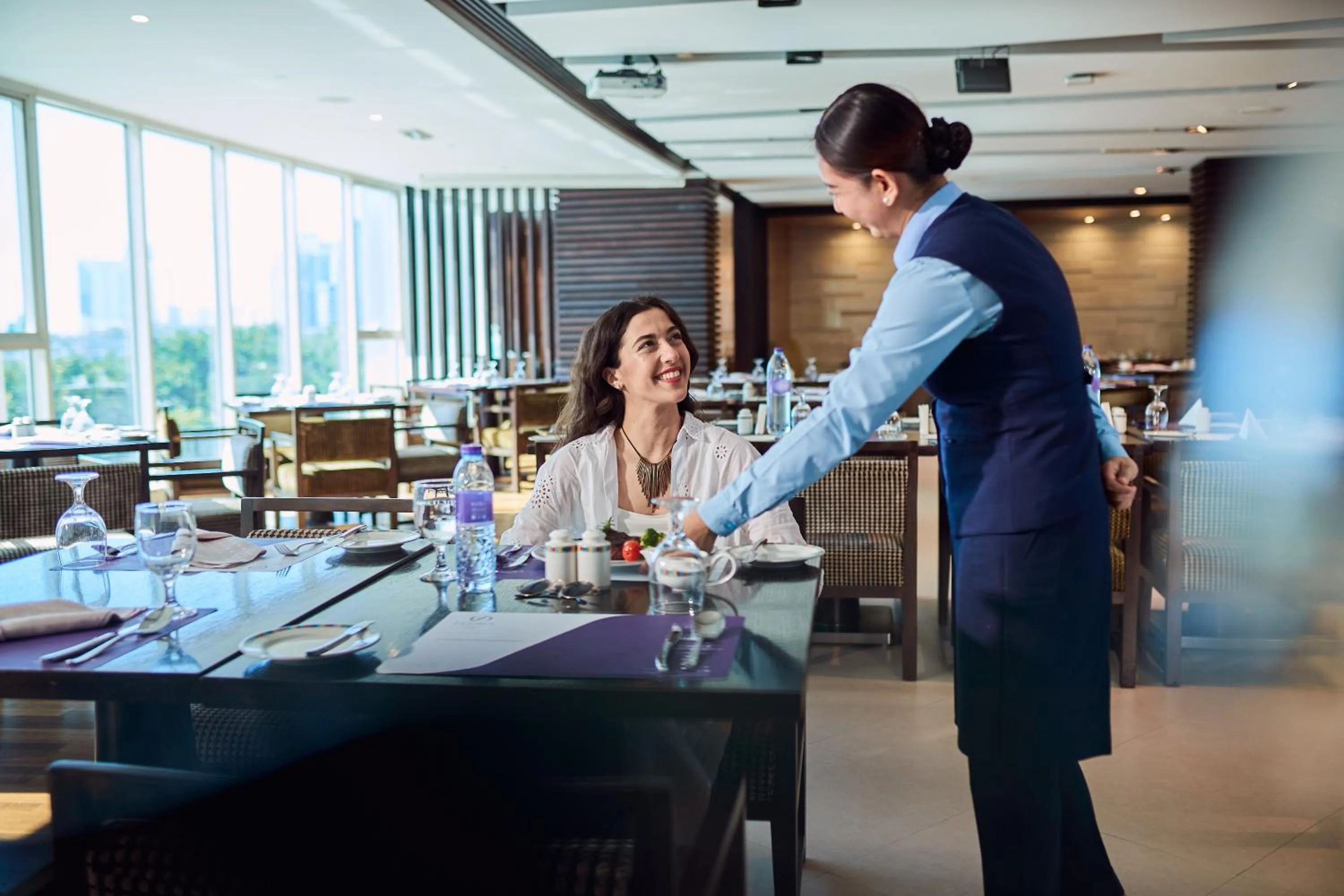 Staff in Flora Creek Deluxe Hotel Apartments, Dubai