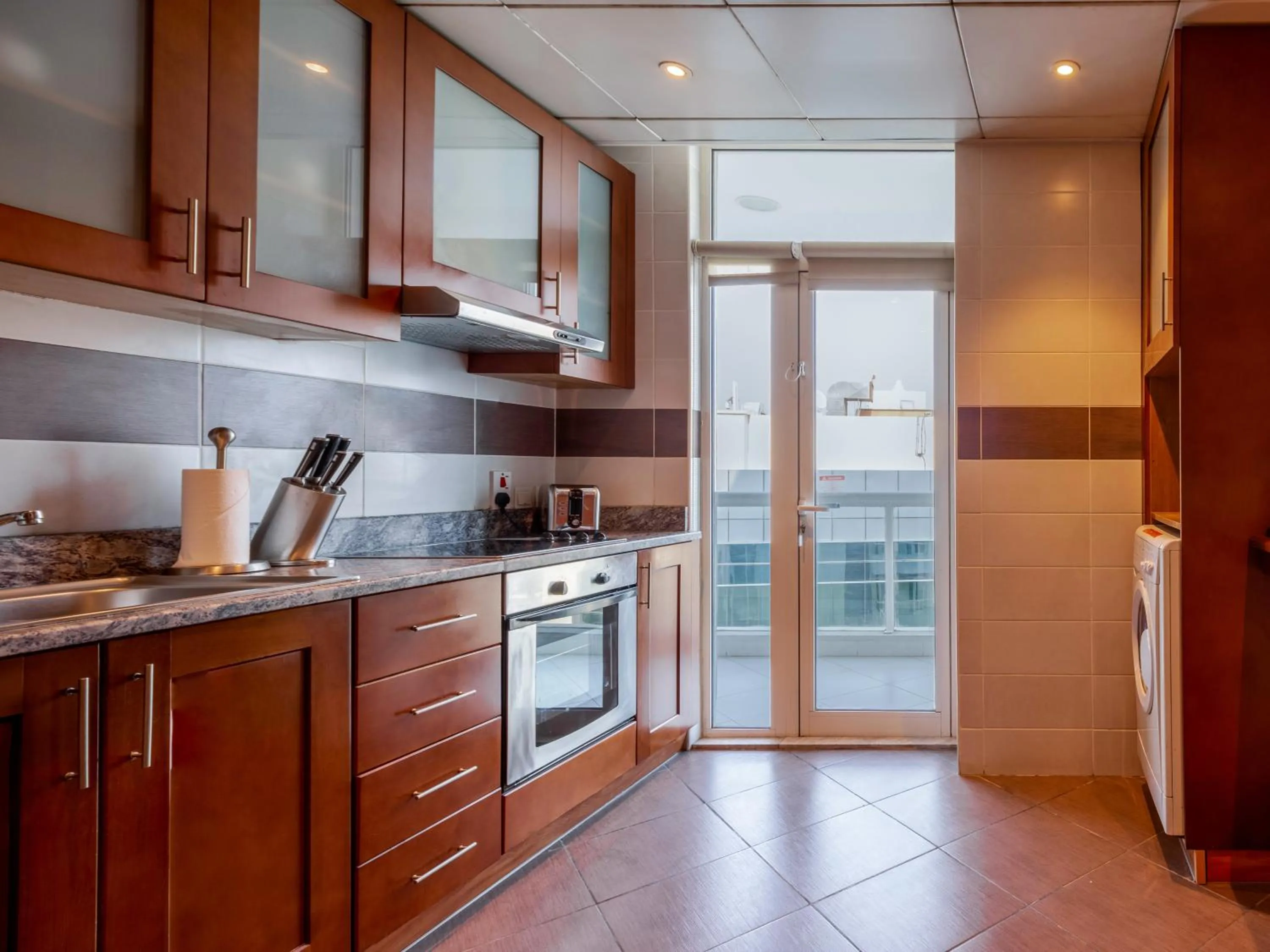 Kitchen or kitchenette in Flora Creek Deluxe Hotel Apartments, Dubai