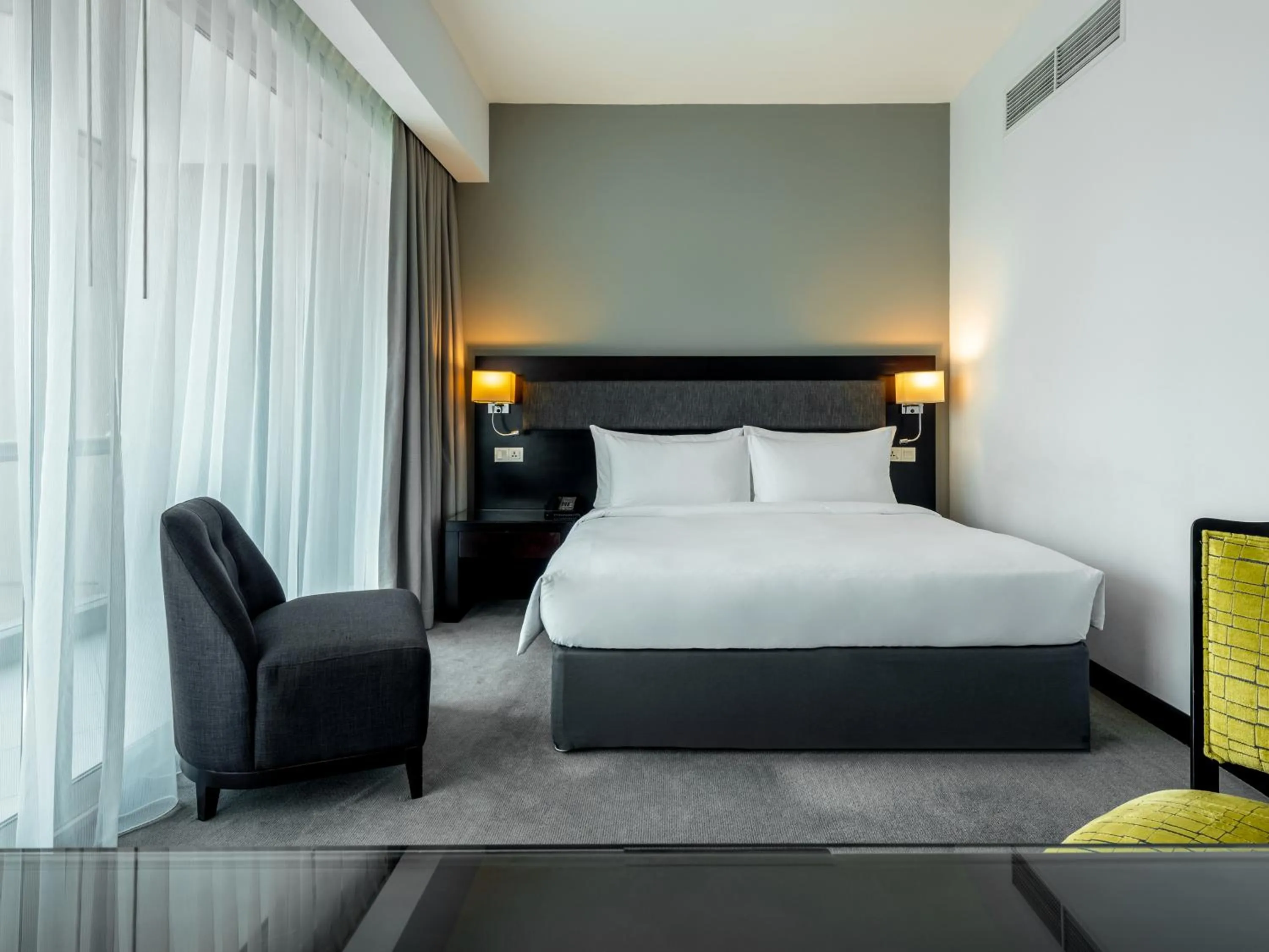 Bed in Flora Creek Deluxe Hotel Apartments, Dubai