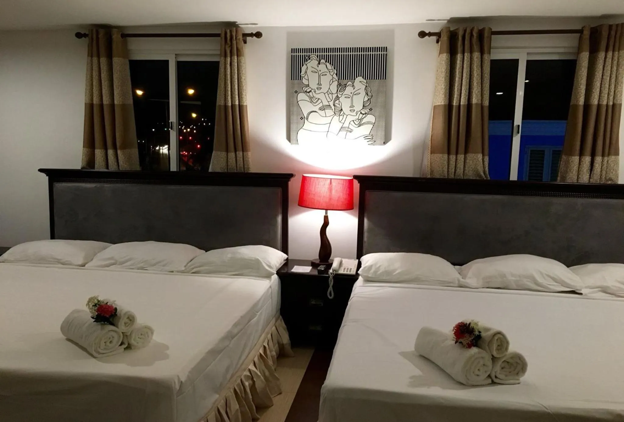 Bed in Curacao Suites Hotel