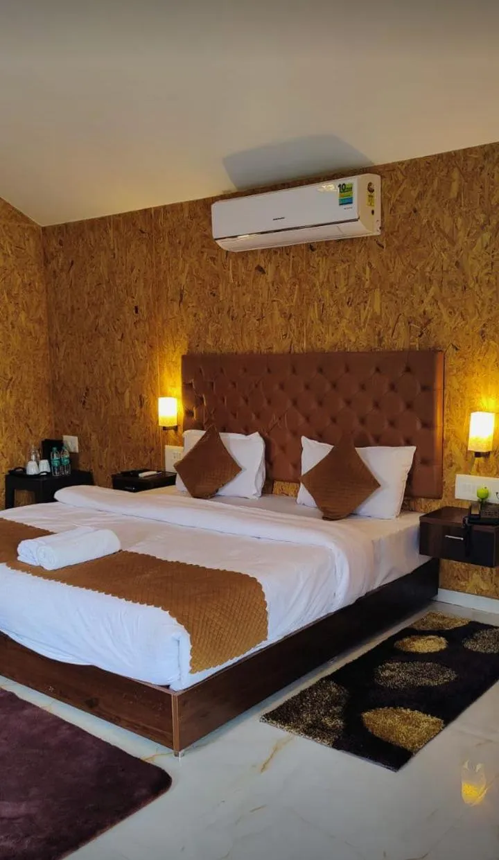 Bed in Bandipur Resort Khan's Gufa