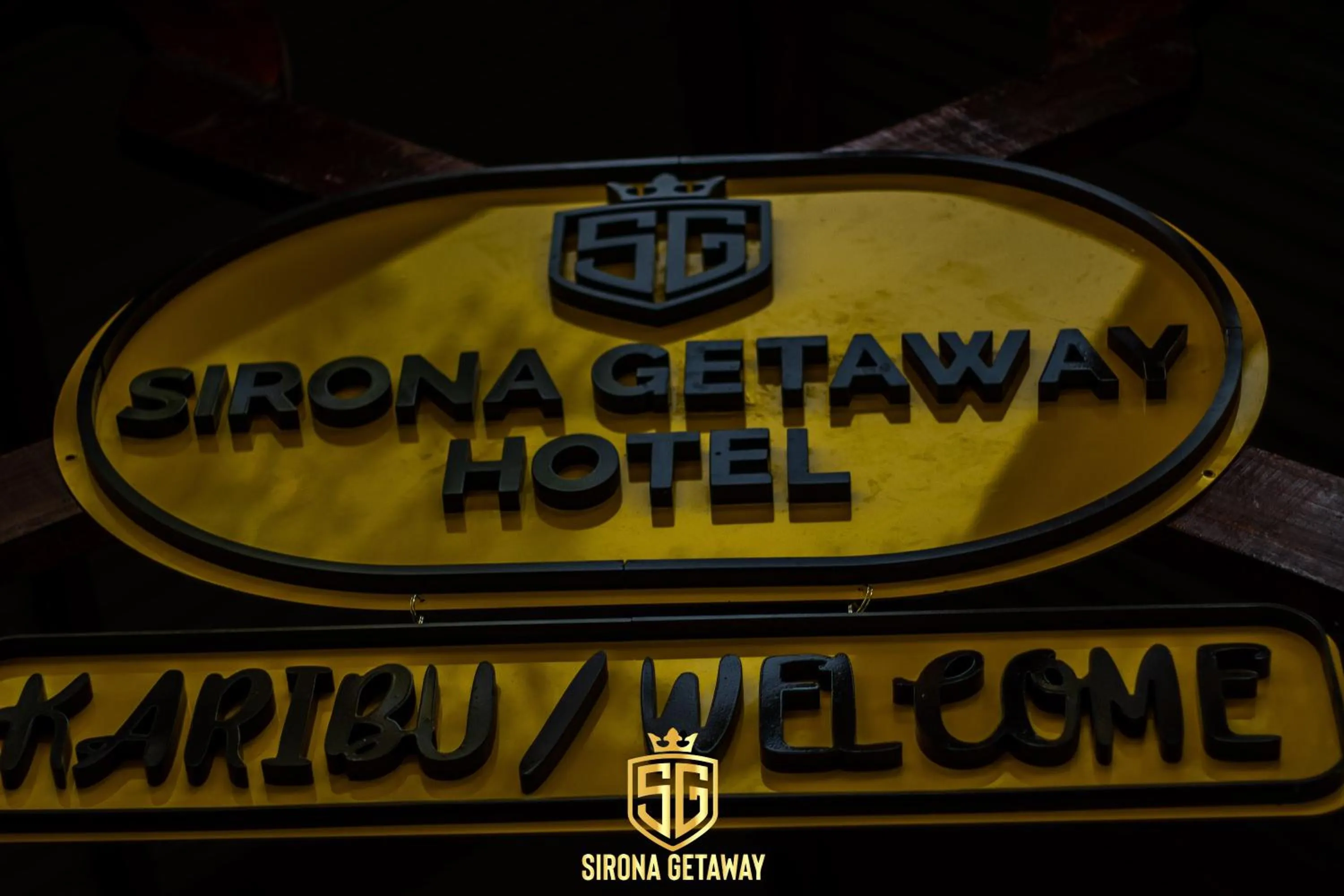 Property logo or sign in Sirona Getaway Hotel