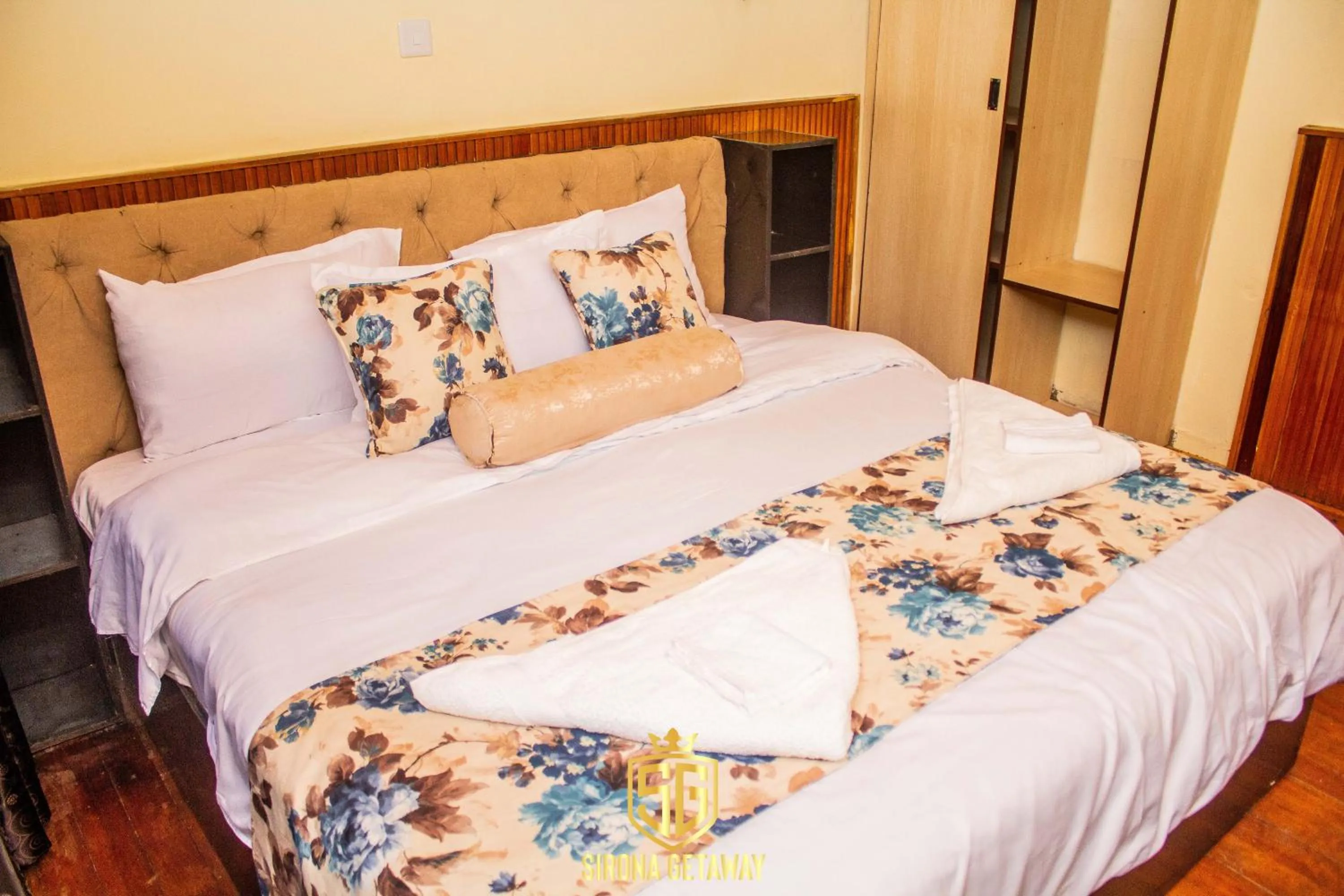 Bed in Sirona Getaway Hotel