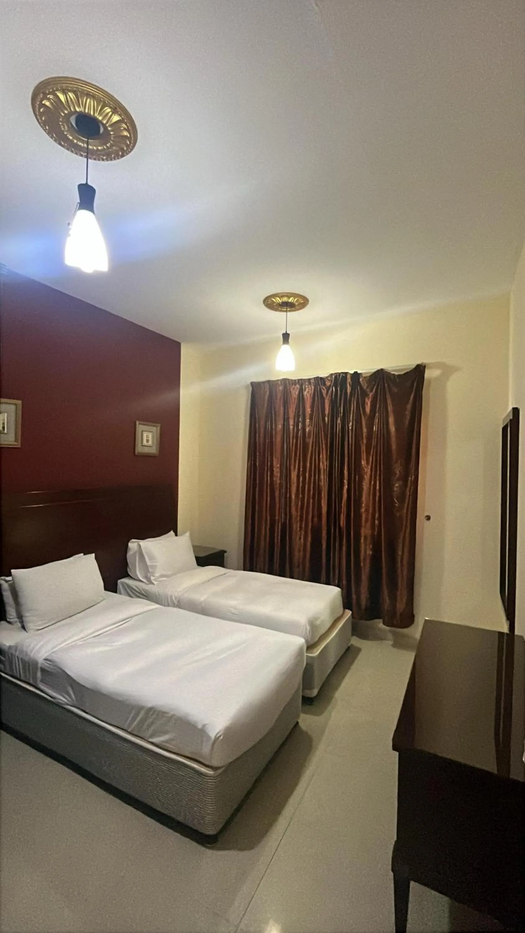 Bed in Clifton International Hotel