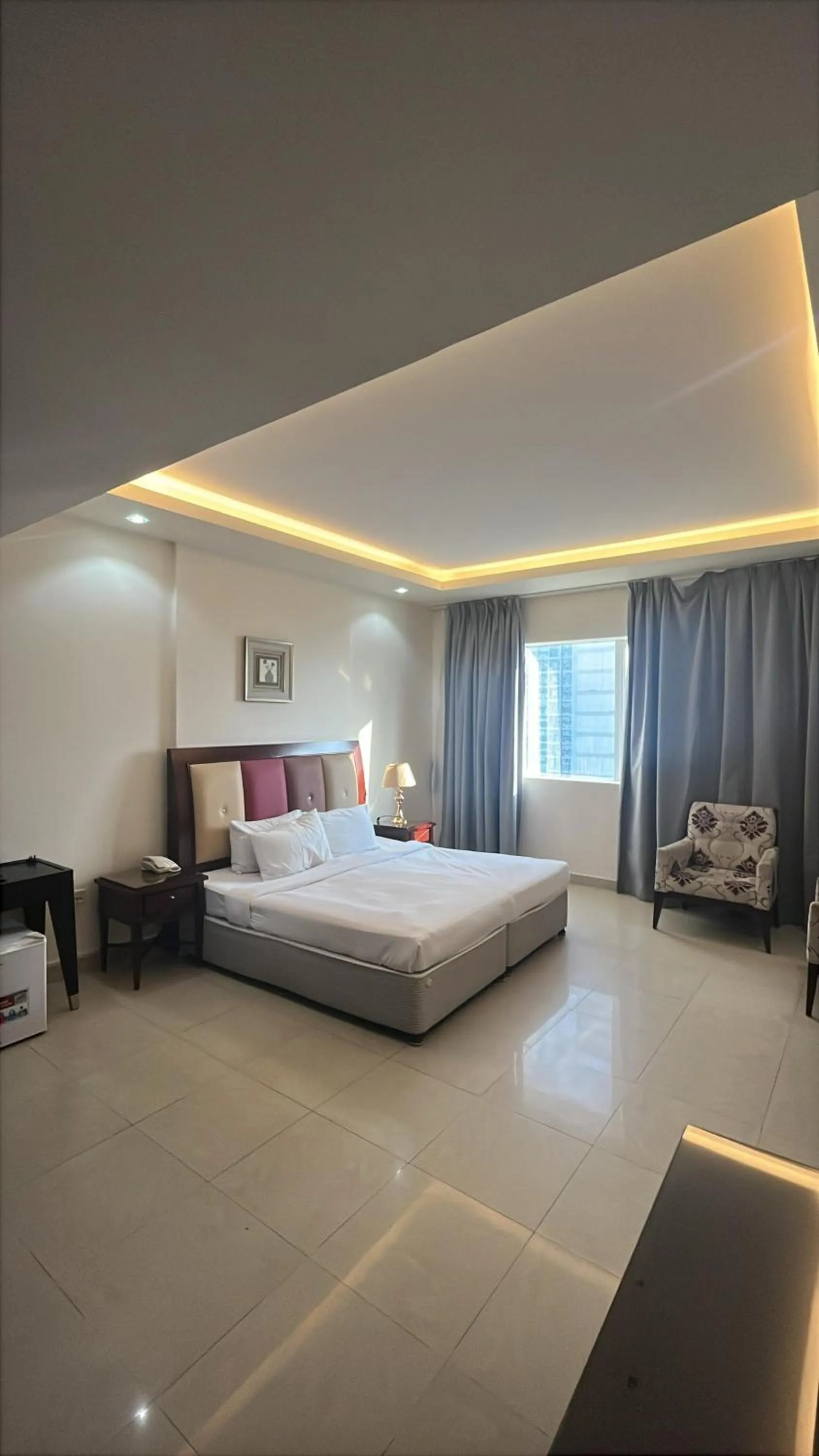 Bed in Clifton International Hotel