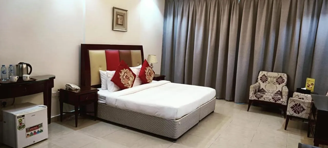Bed in Clifton International Hotel