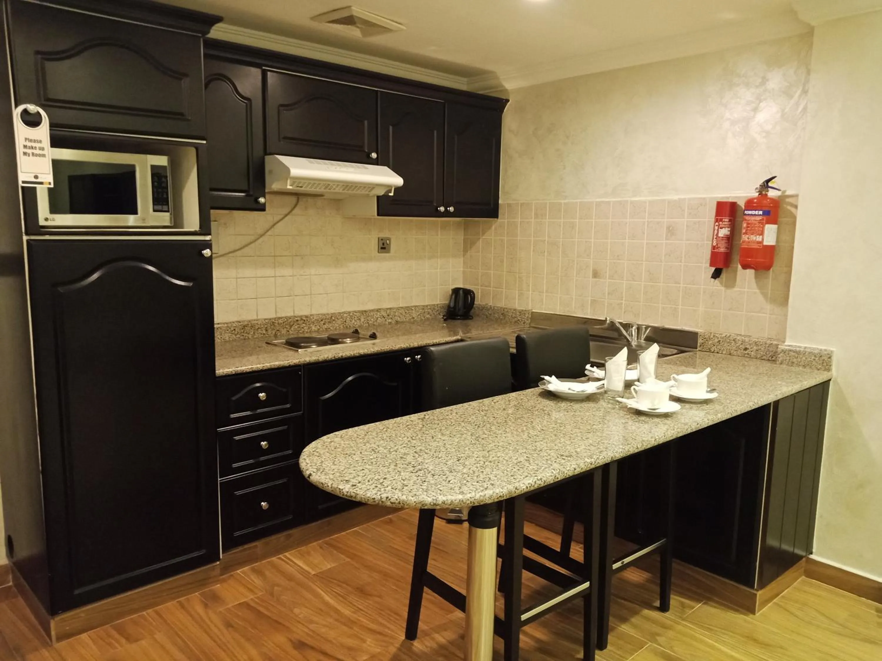 Kitchen or kitchenette in Le Park Hotel