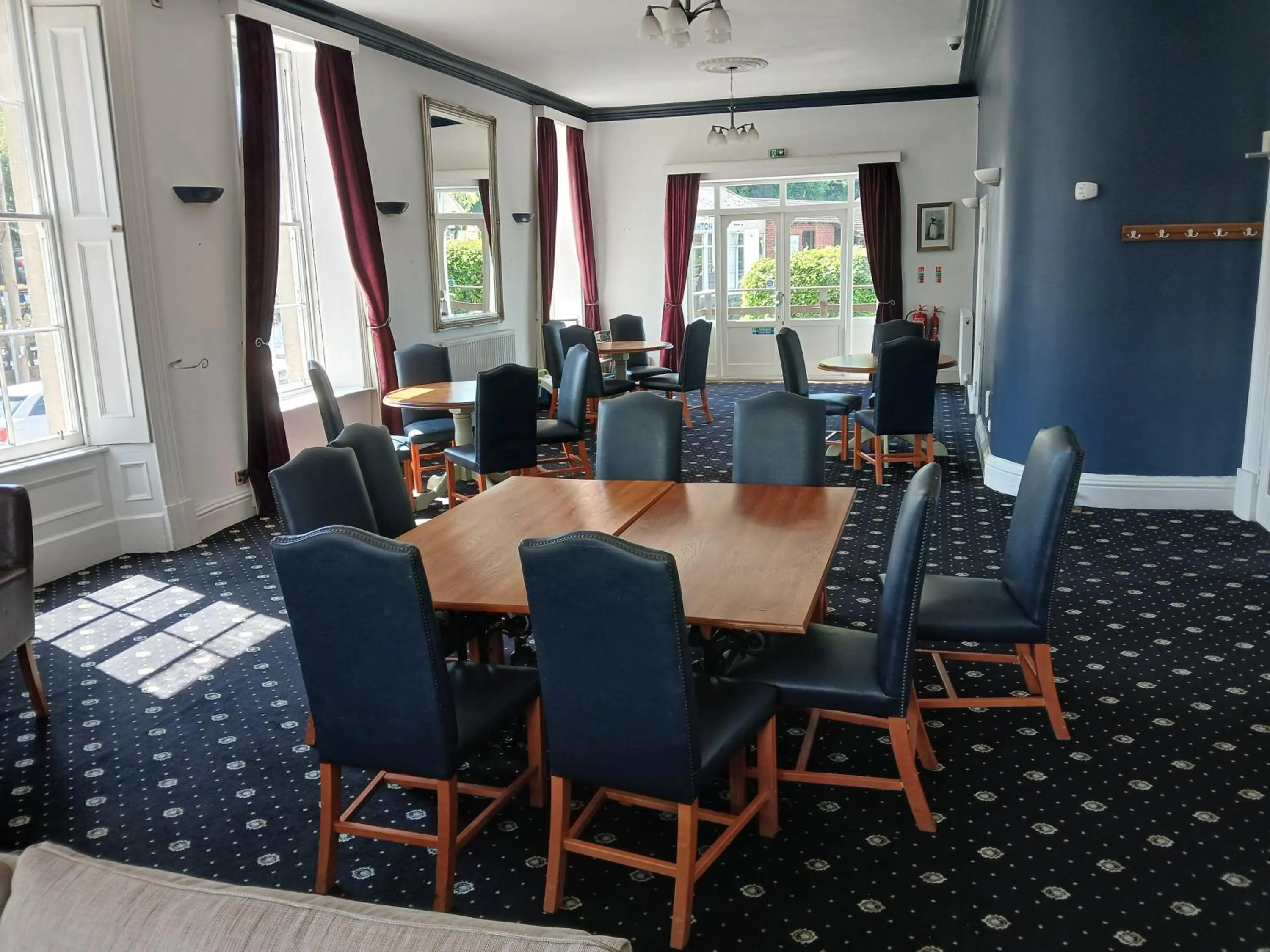 Communal lounge/ TV room in The Knighton Hotel