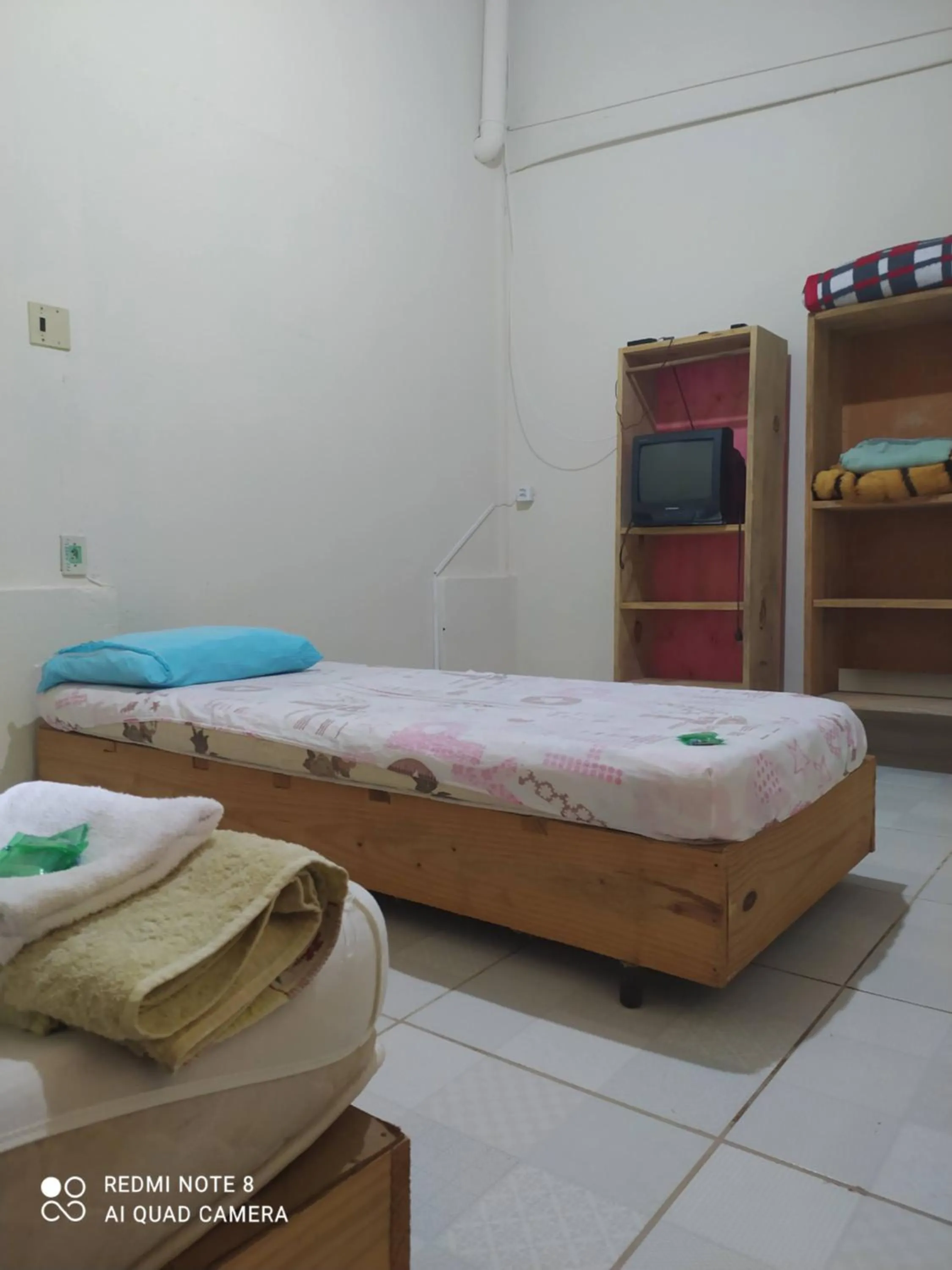 Bed in Pousada do Ribeirão