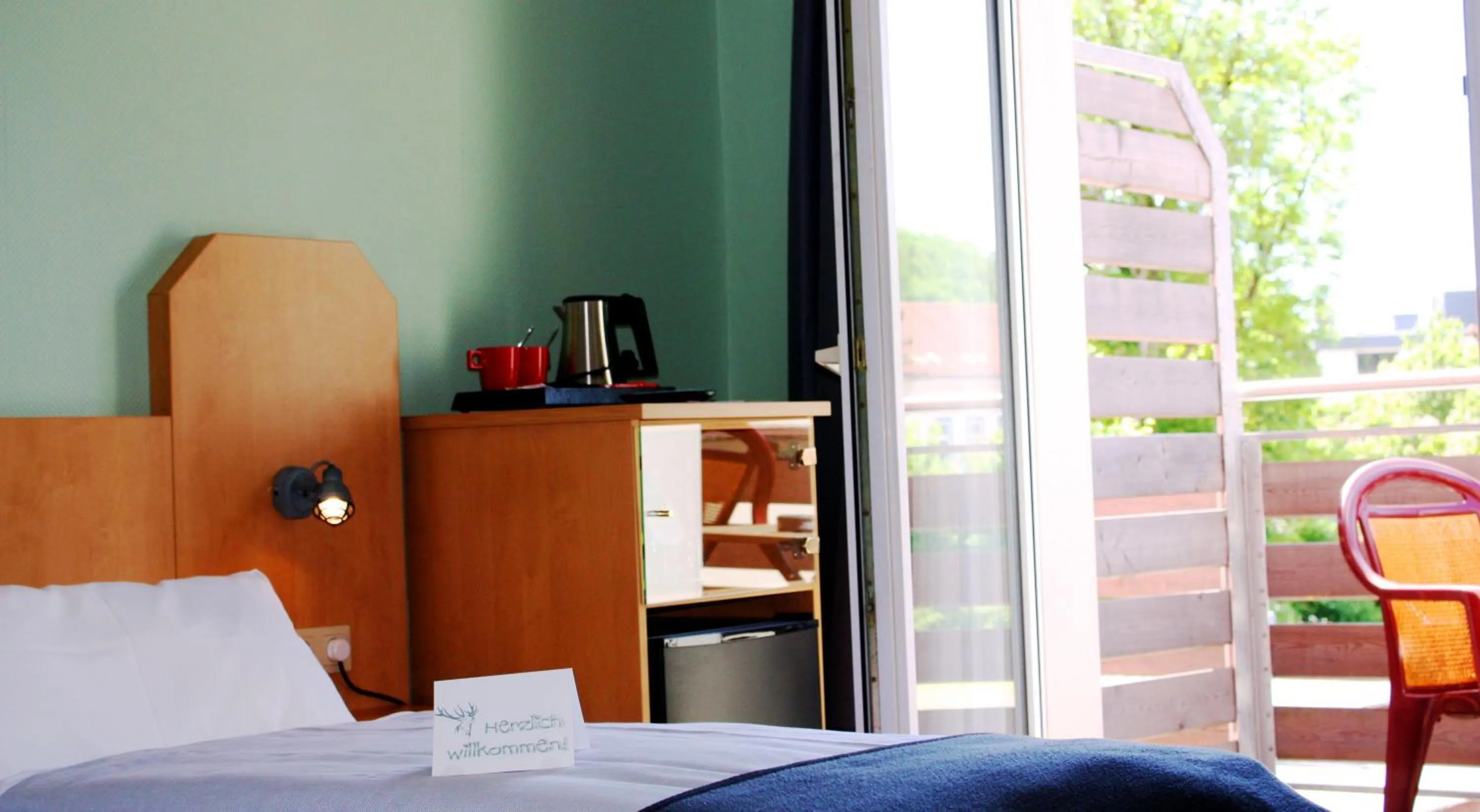 Property building, Bed in Hotel am Kurpark