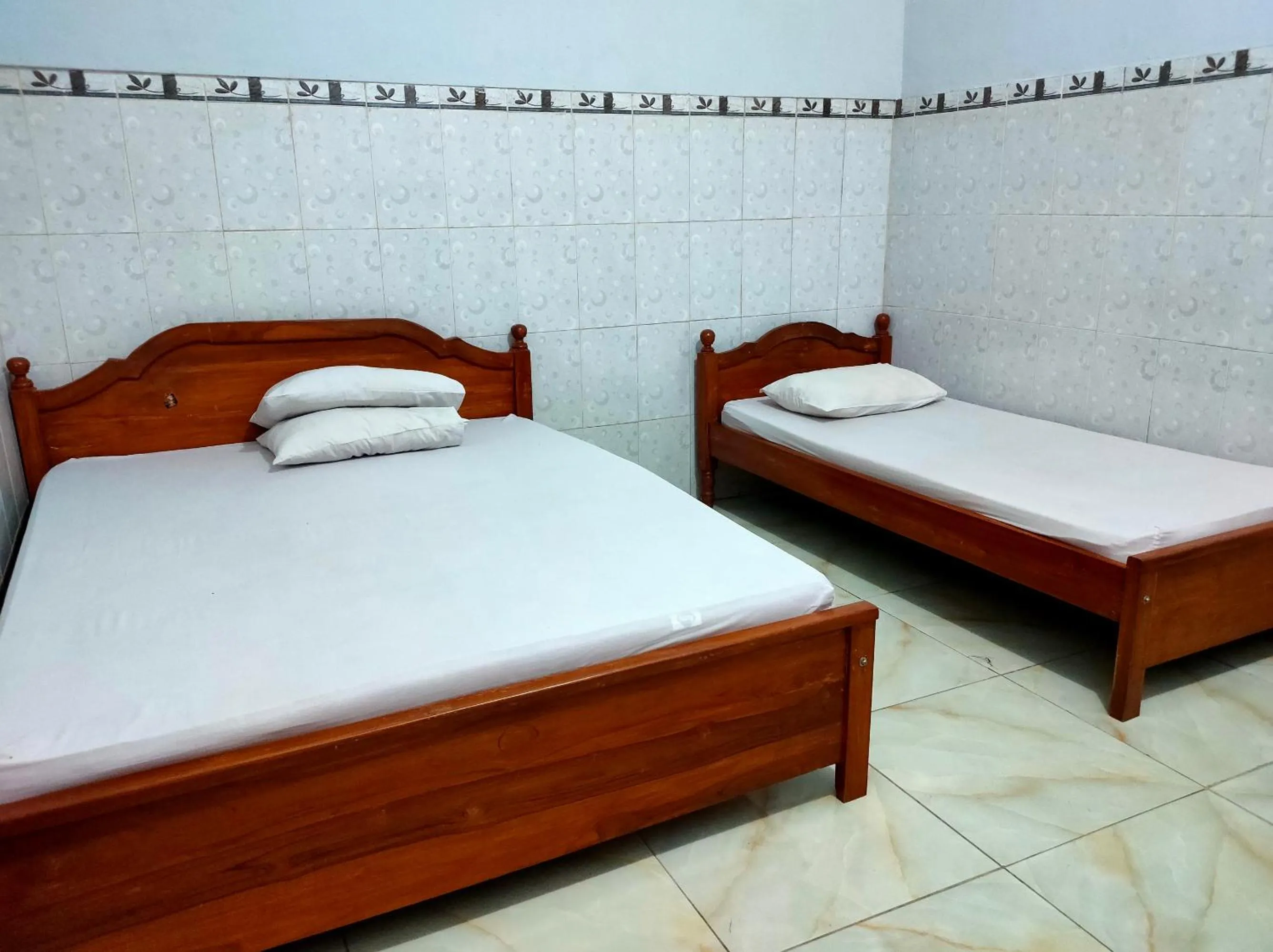 Bedroom, Bed in Hotel Keluarga Mekar Jaya Syariah Near UNS Solo