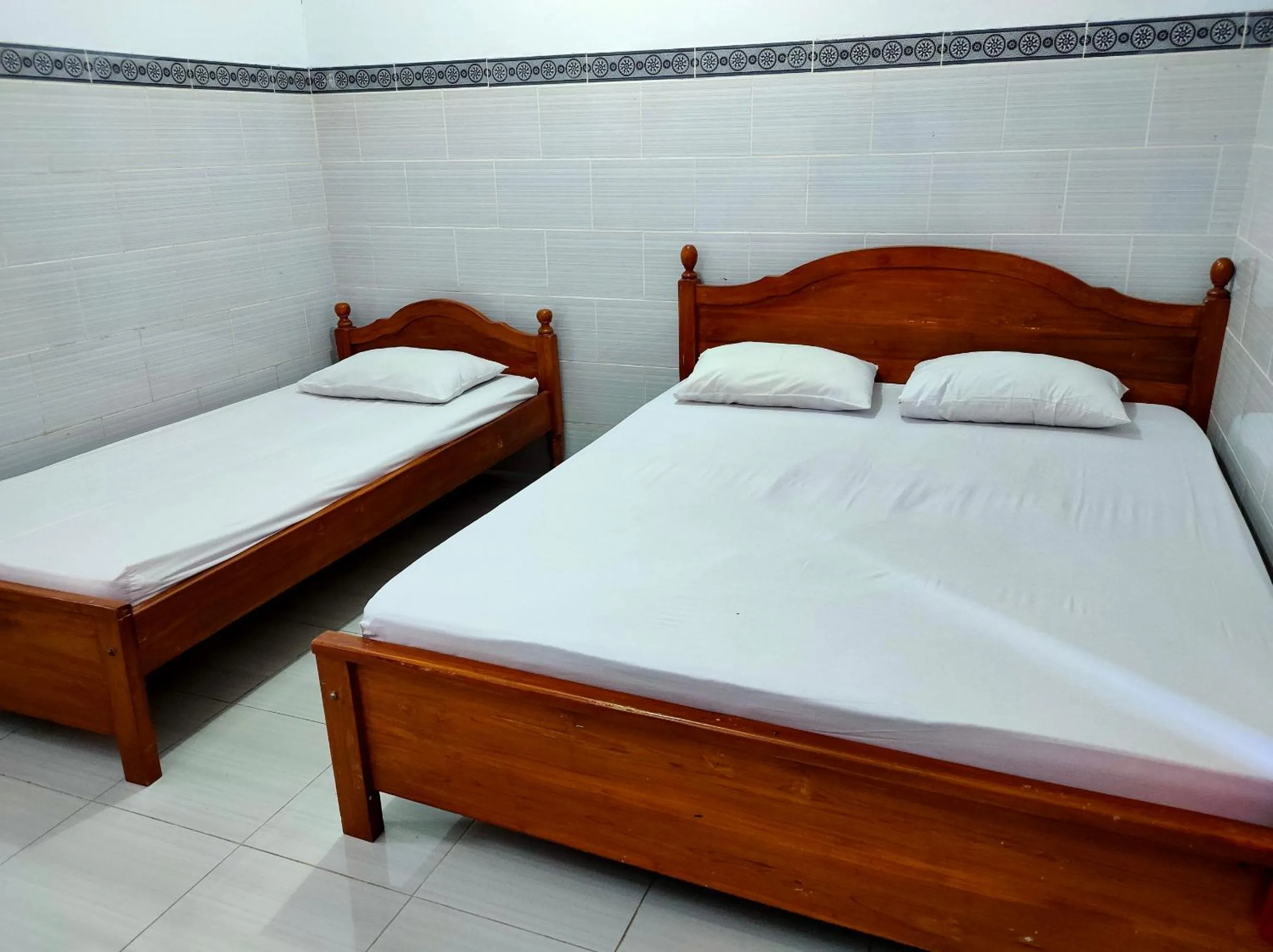 Bedroom, Bed in Hotel Keluarga Mekar Jaya Syariah Near UNS Solo