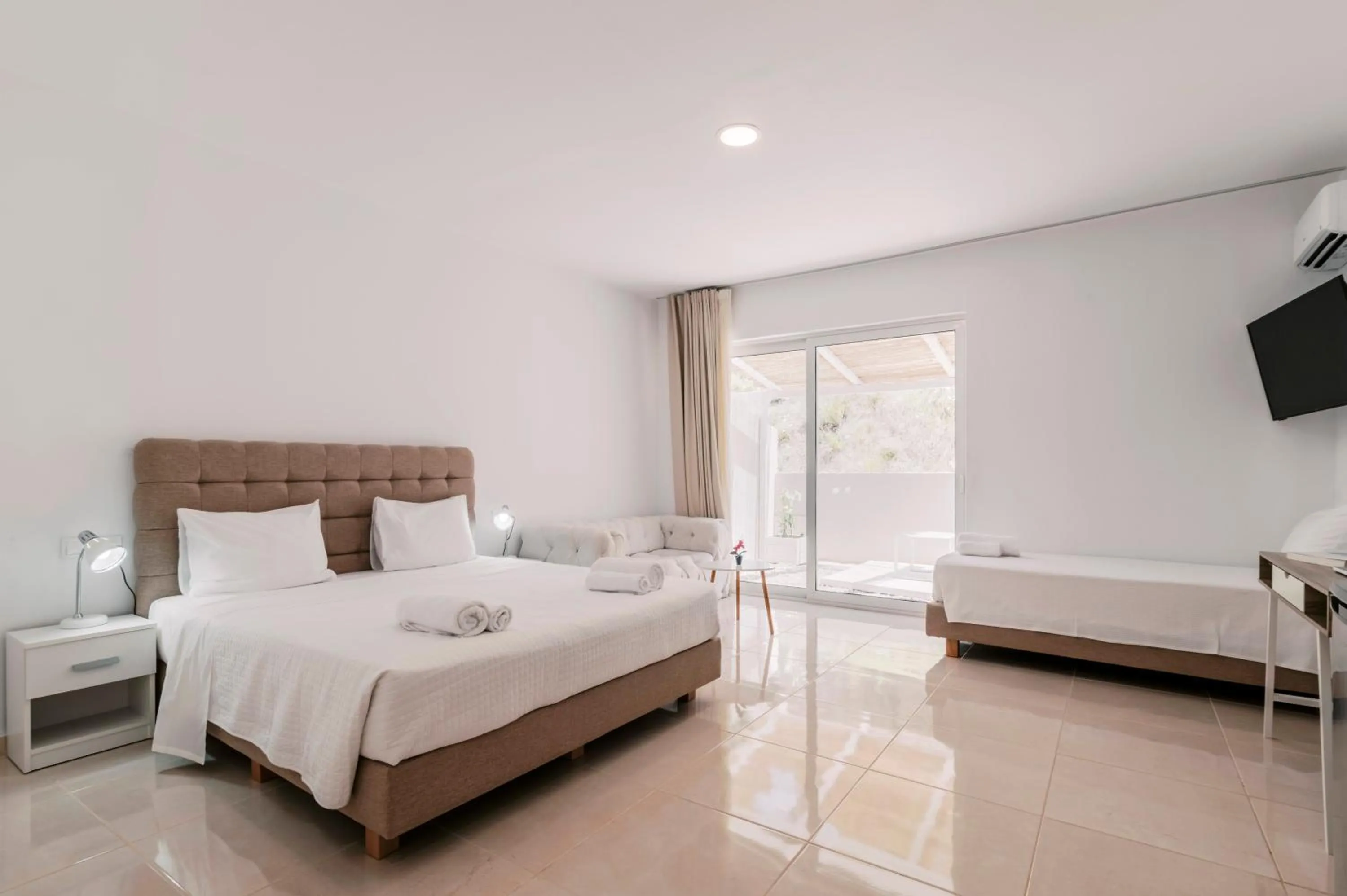 Bed in Bamboo Suites Hotel - Adults Only