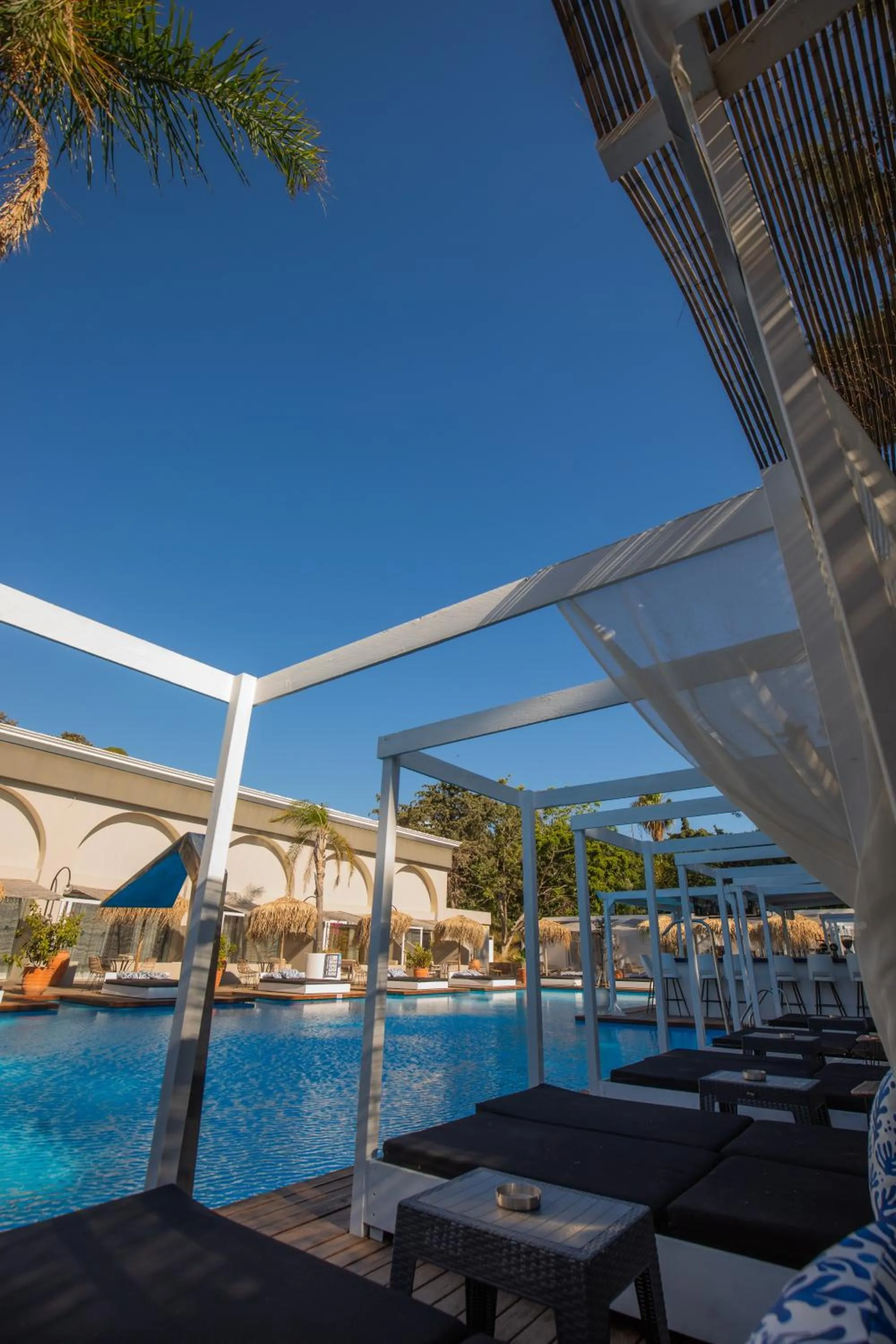 Swimming pool in Bamboo Suites Hotel - Adults Only