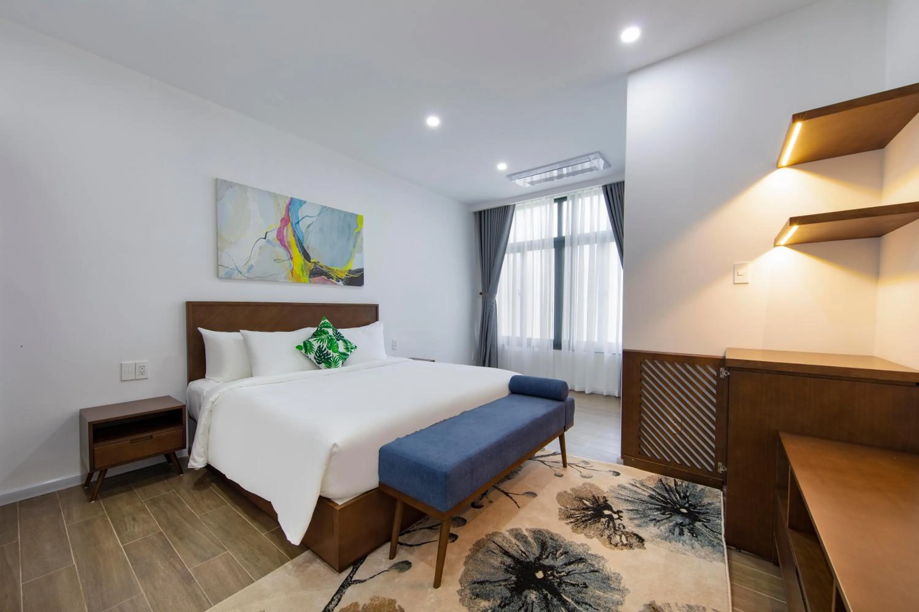 Bedroom, Bed in Le Palmier Ho Tram Resort - Beachfront with Private Beach