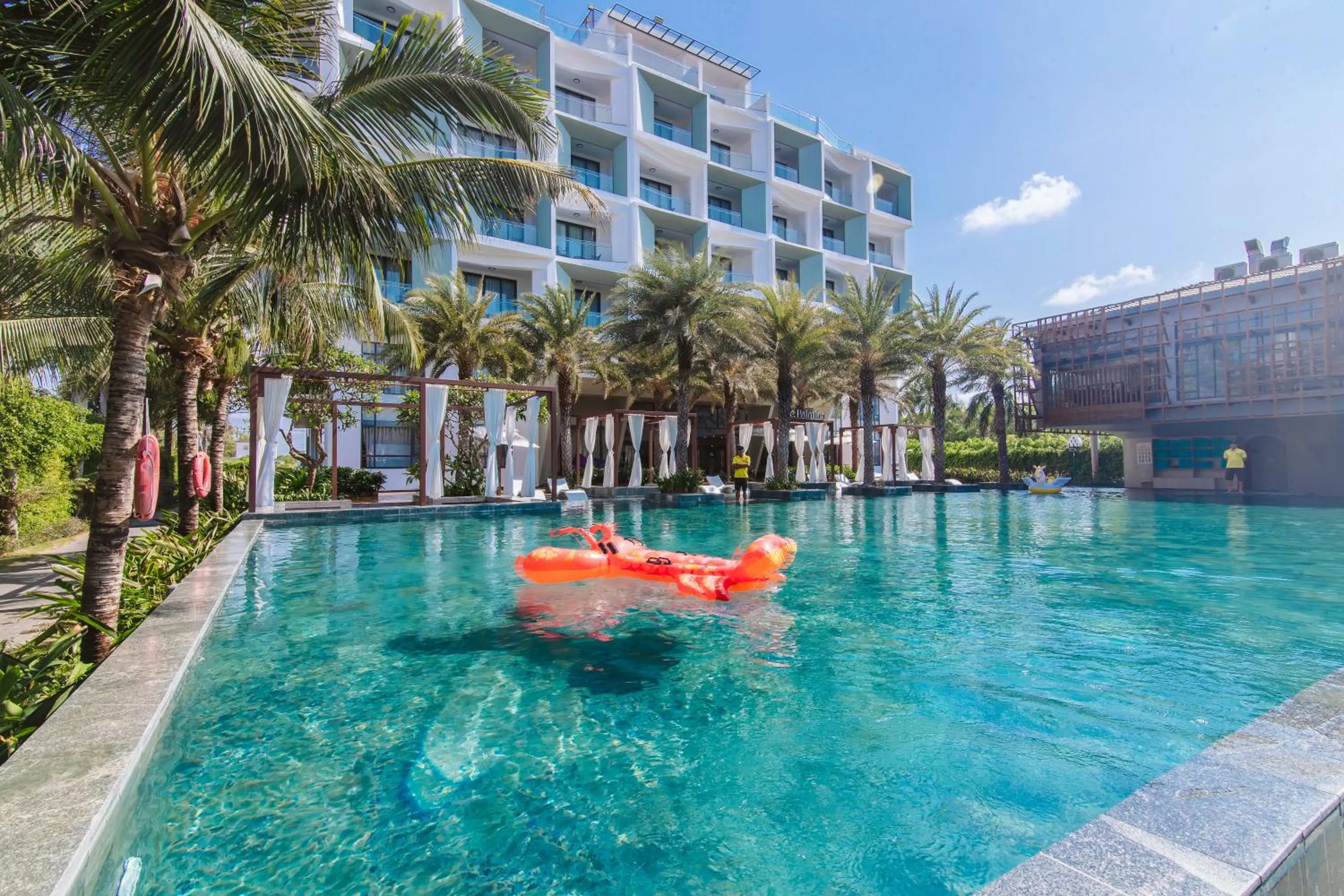 Swimming pool in Le Palmier Ho Tram Resort - Beachfront with Private Beach