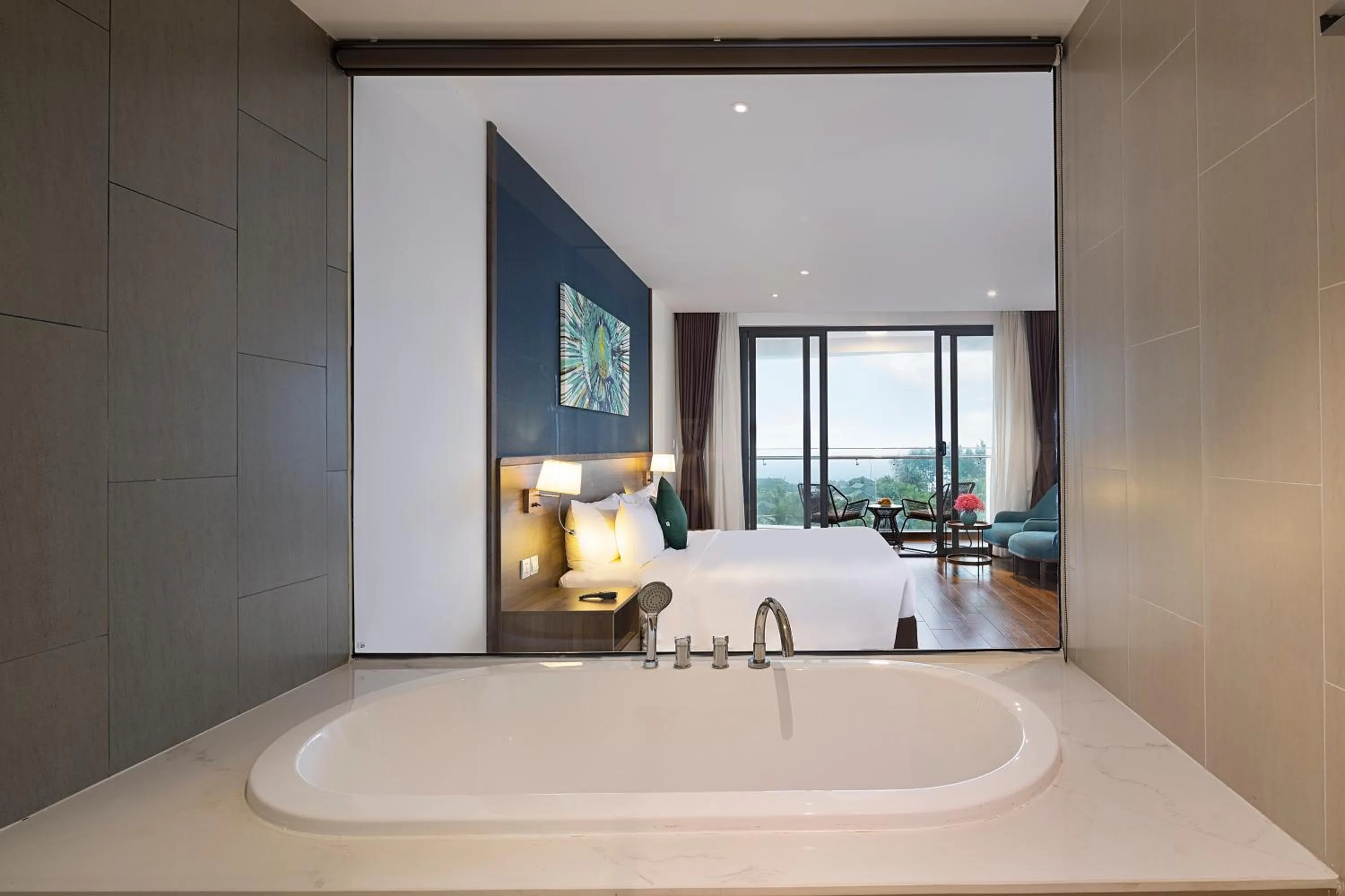 Bath, Bed in Le Palmier Ho Tram Resort - Beachfront with Private Beach