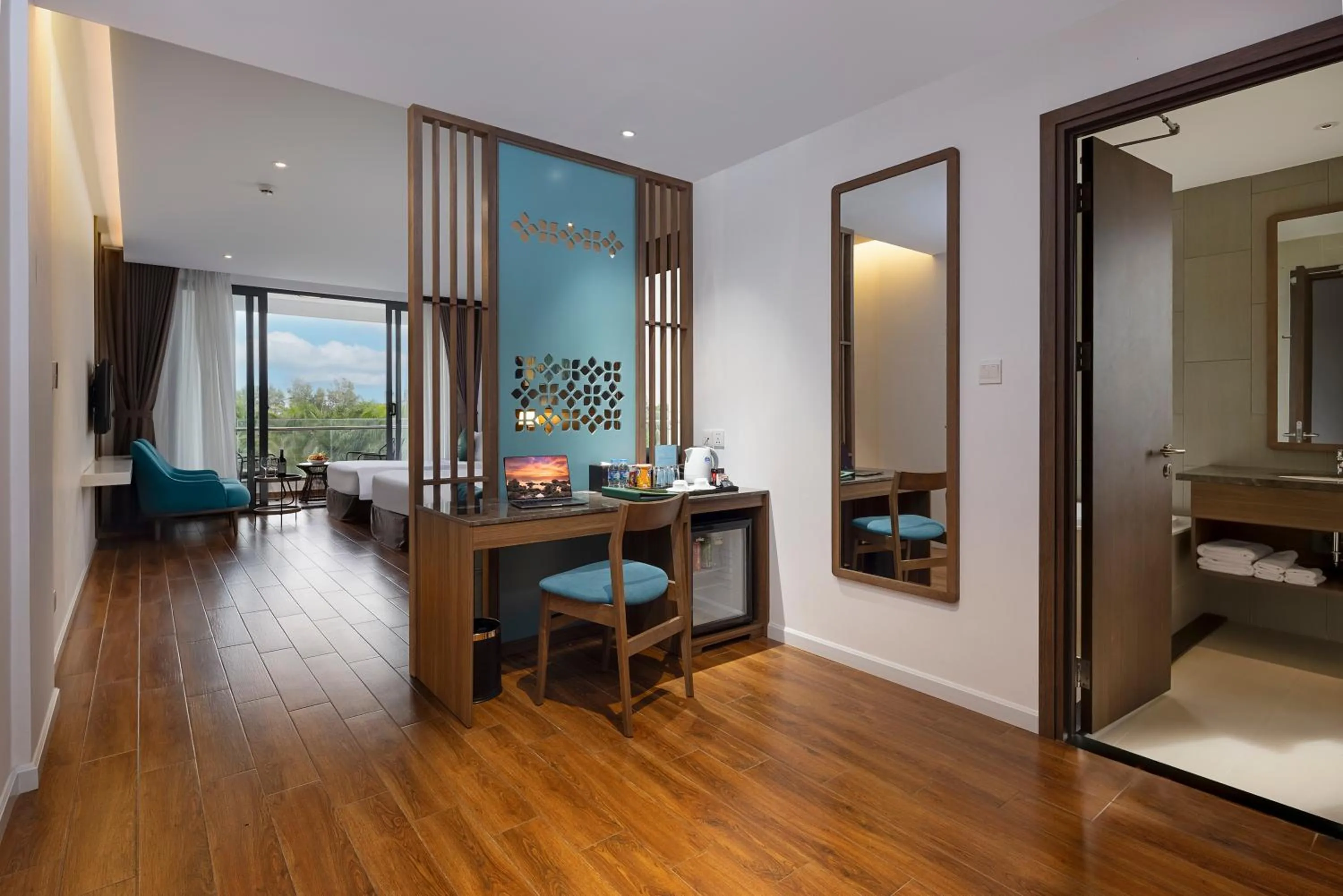 Bedroom, Bed in Le Palmier Ho Tram Resort - Beachfront with Private Beach