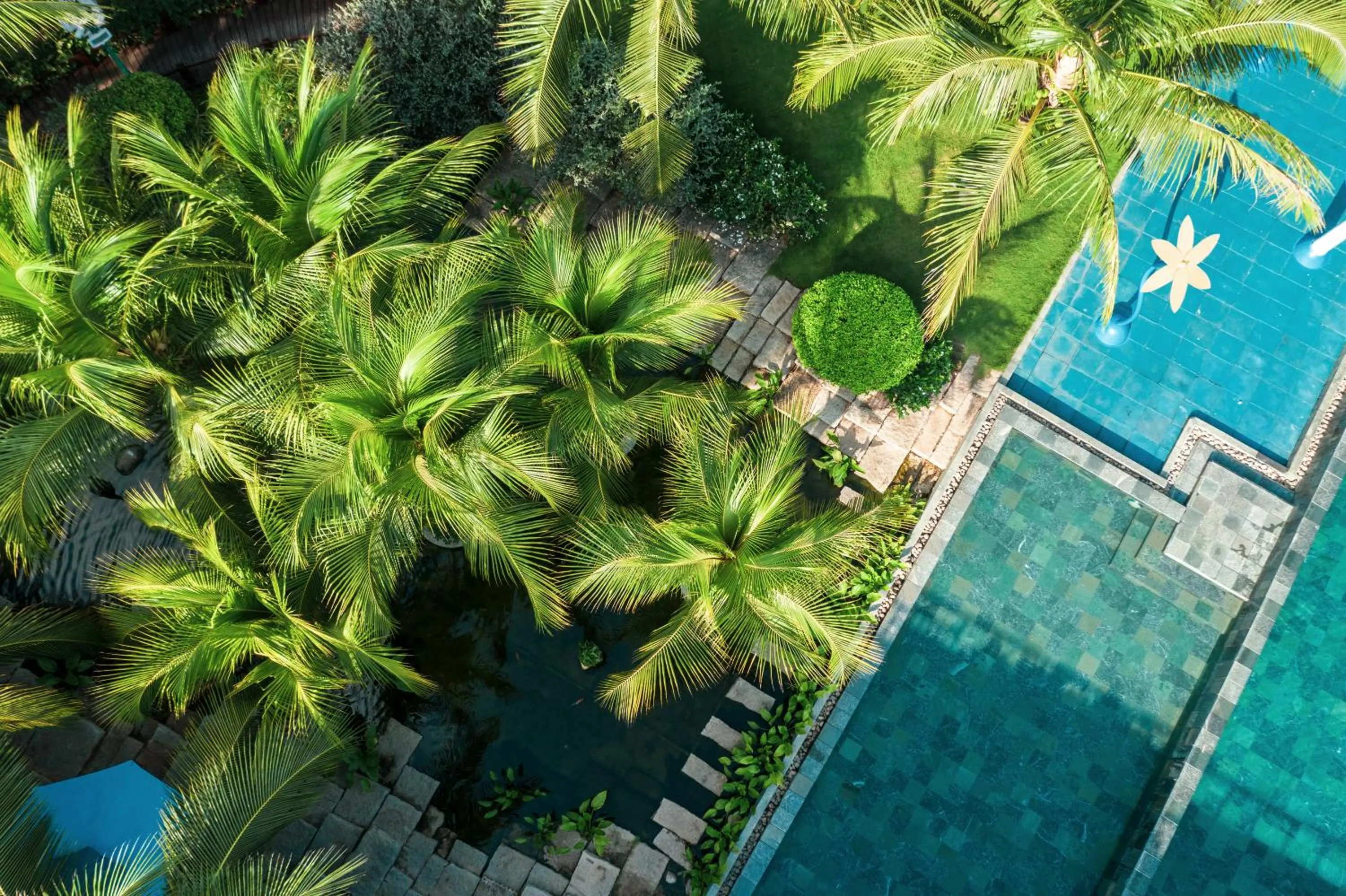 Swimming pool in Le Palmier Ho Tram Resort - Beachfront with Private Beach