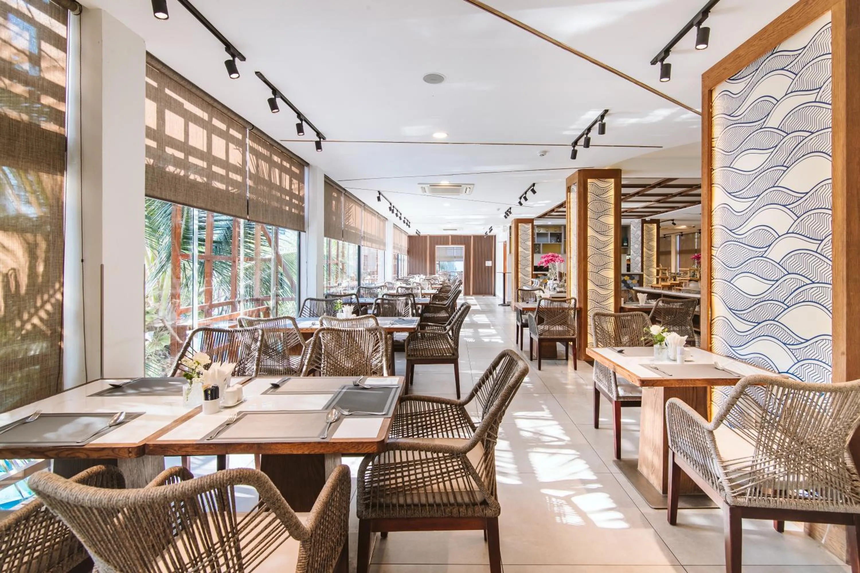 Restaurant/places to eat in Le Palmier Ho Tram Resort - Beachfront with Private Beach