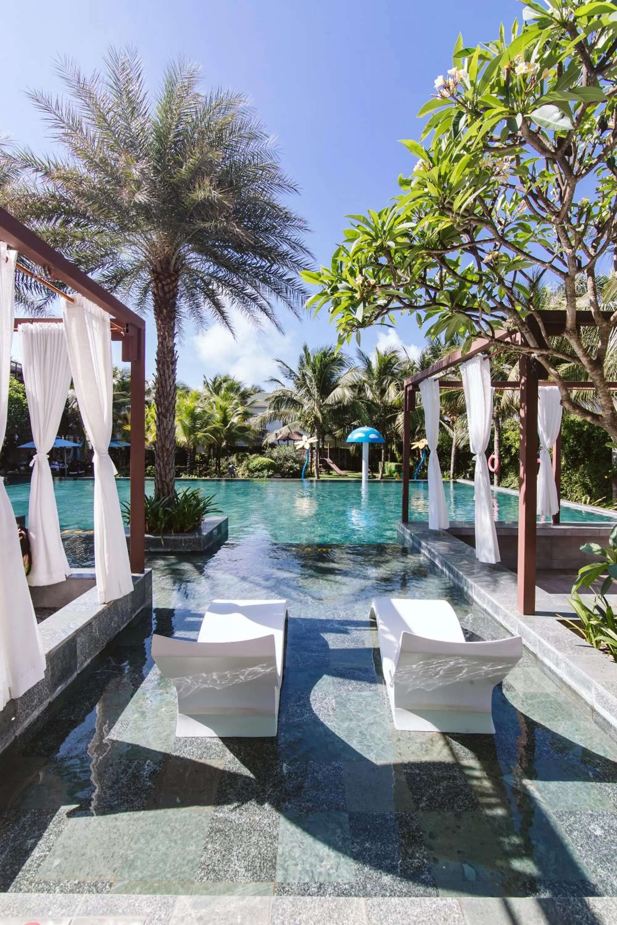 Swimming pool in Le Palmier Ho Tram Resort - Beachfront with Private Beach