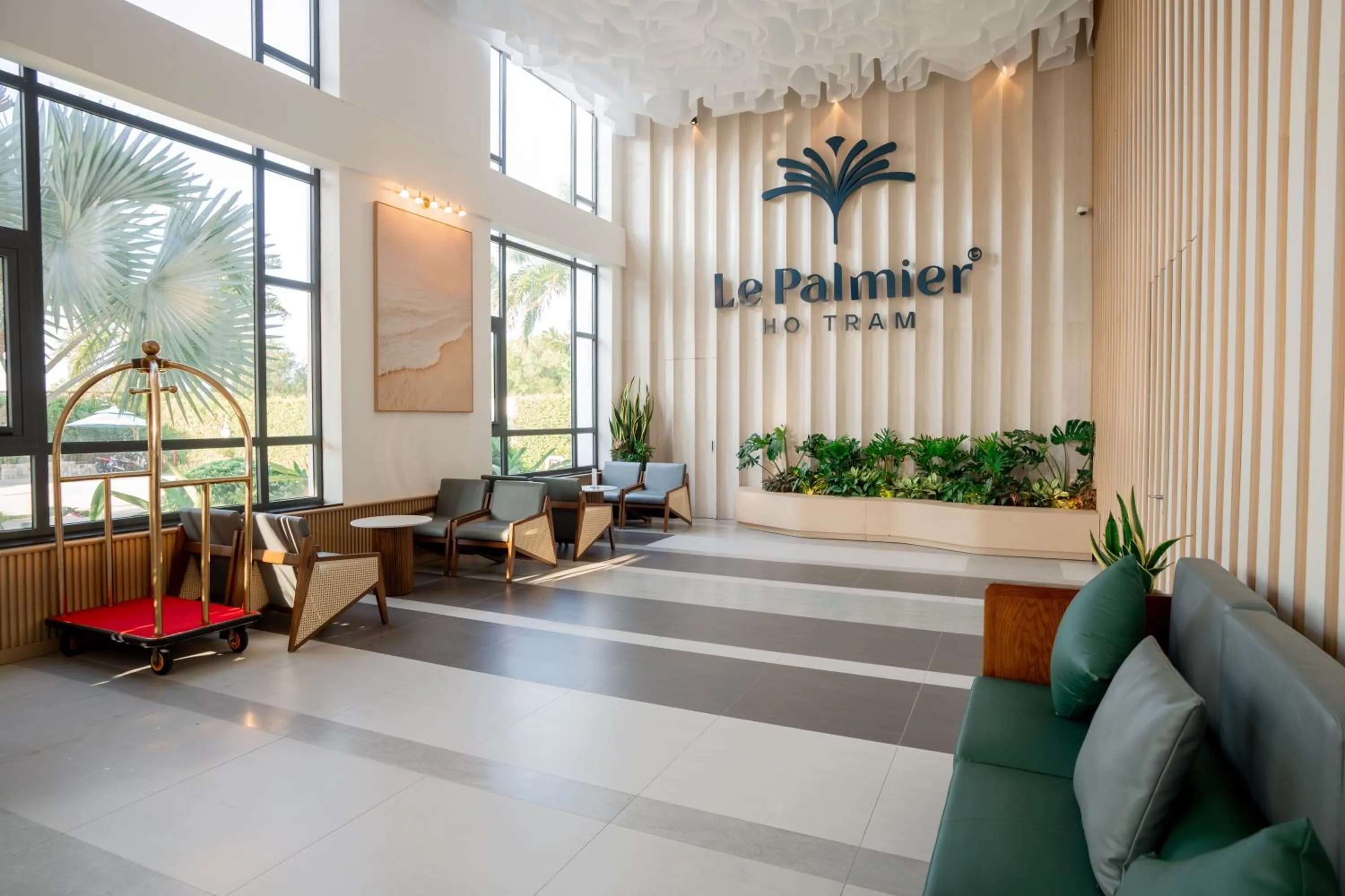 concierge in Le Palmier Ho Tram Resort - Beachfront with Private Beach