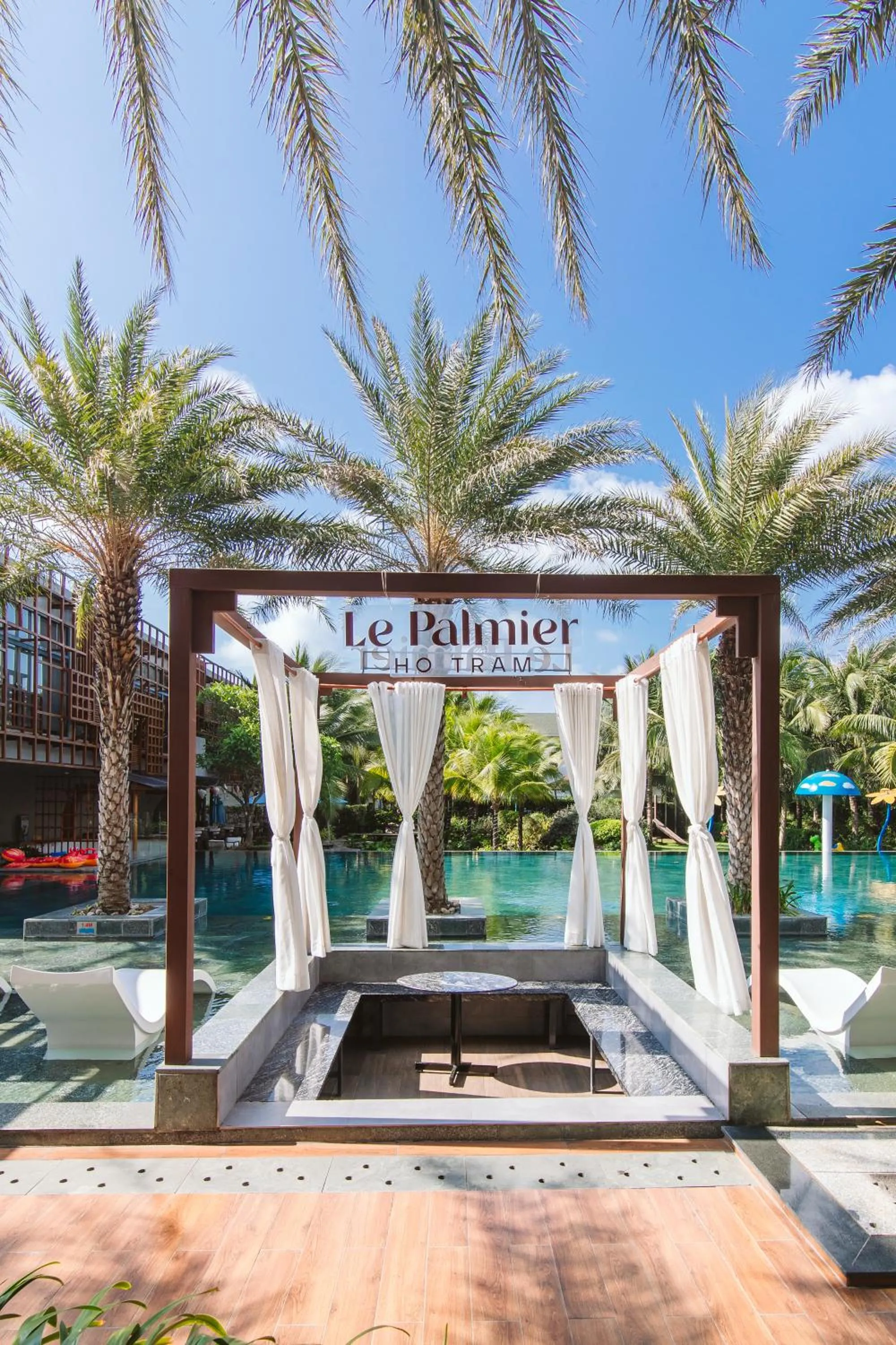 Swimming pool in Le Palmier Ho Tram Resort - Beachfront with Private Beach