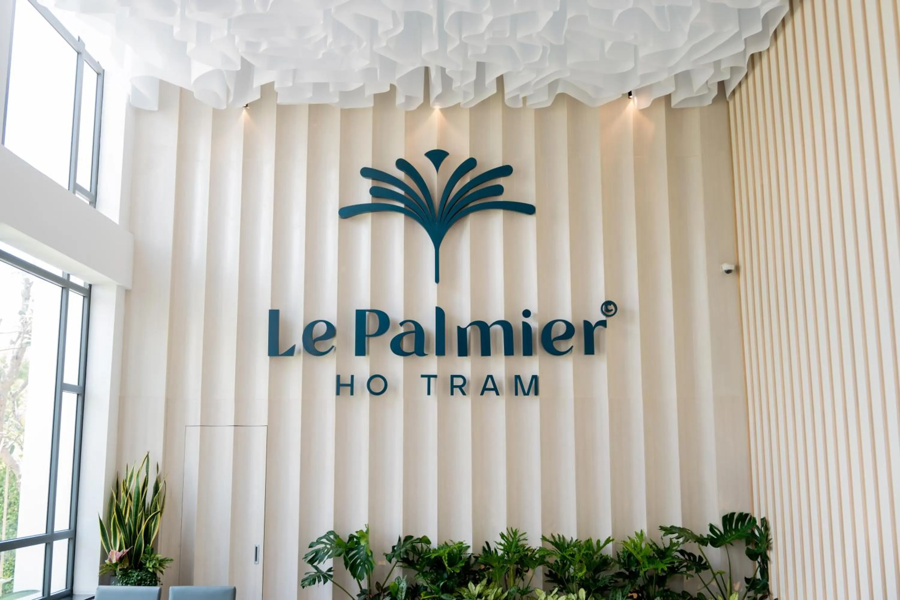 Lobby or reception in Le Palmier Ho Tram Resort - Beachfront with Private Beach