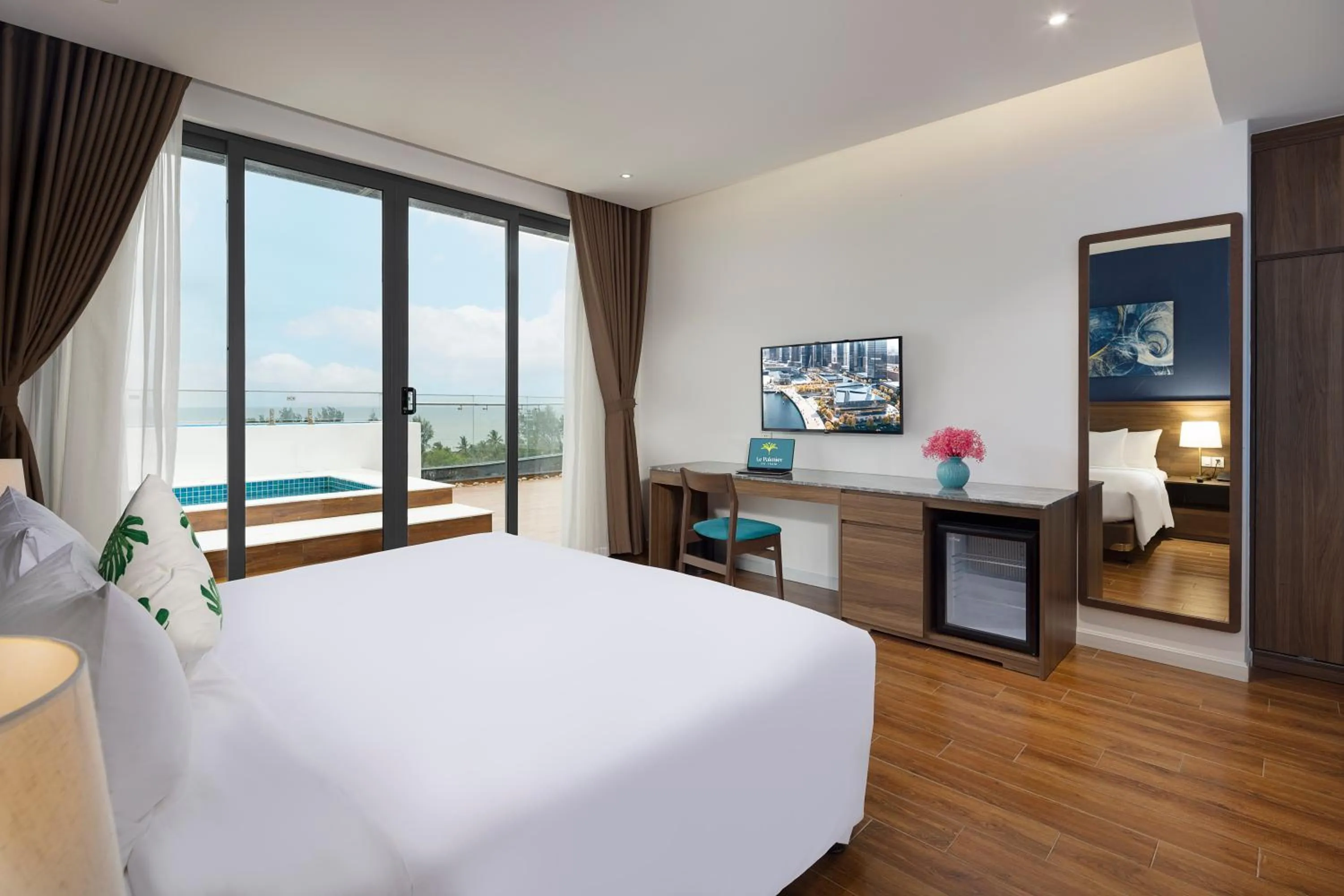 Bedroom, Bed in Le Palmier Ho Tram Resort - Beachfront with Private Beach