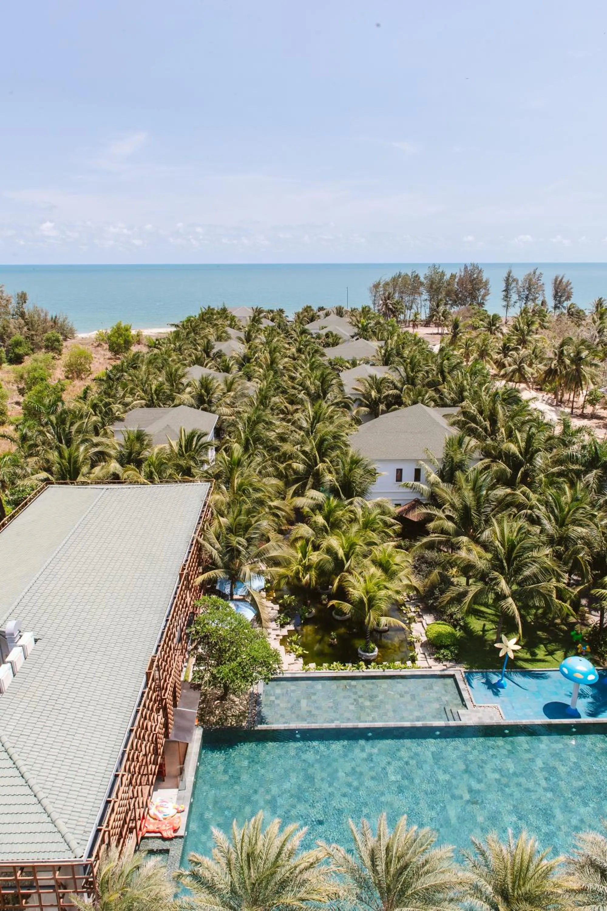 Swimming pool in Le Palmier Ho Tram Resort - Beachfront with Private Beach