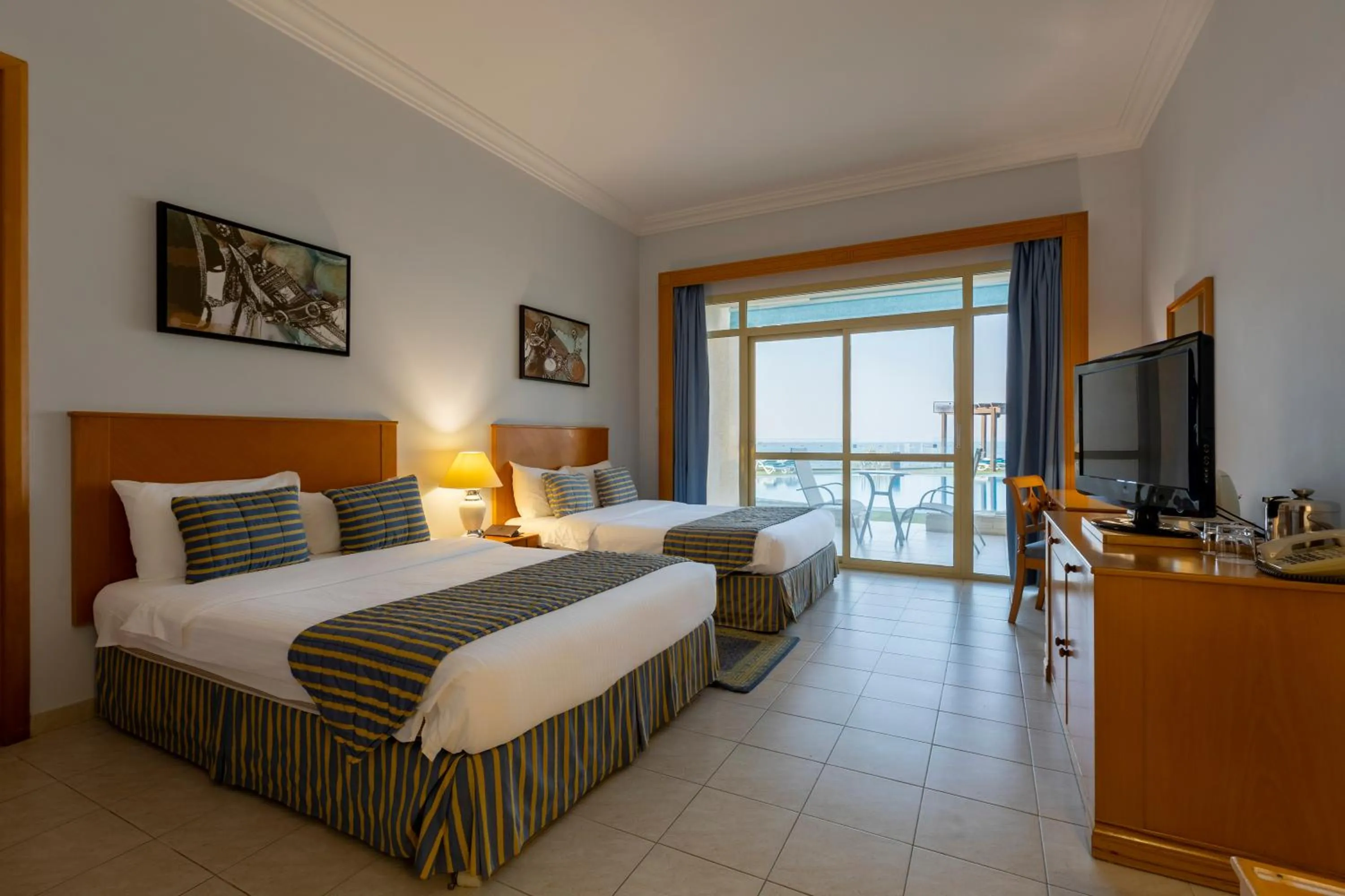 Bed in Atana Khasab Hotel