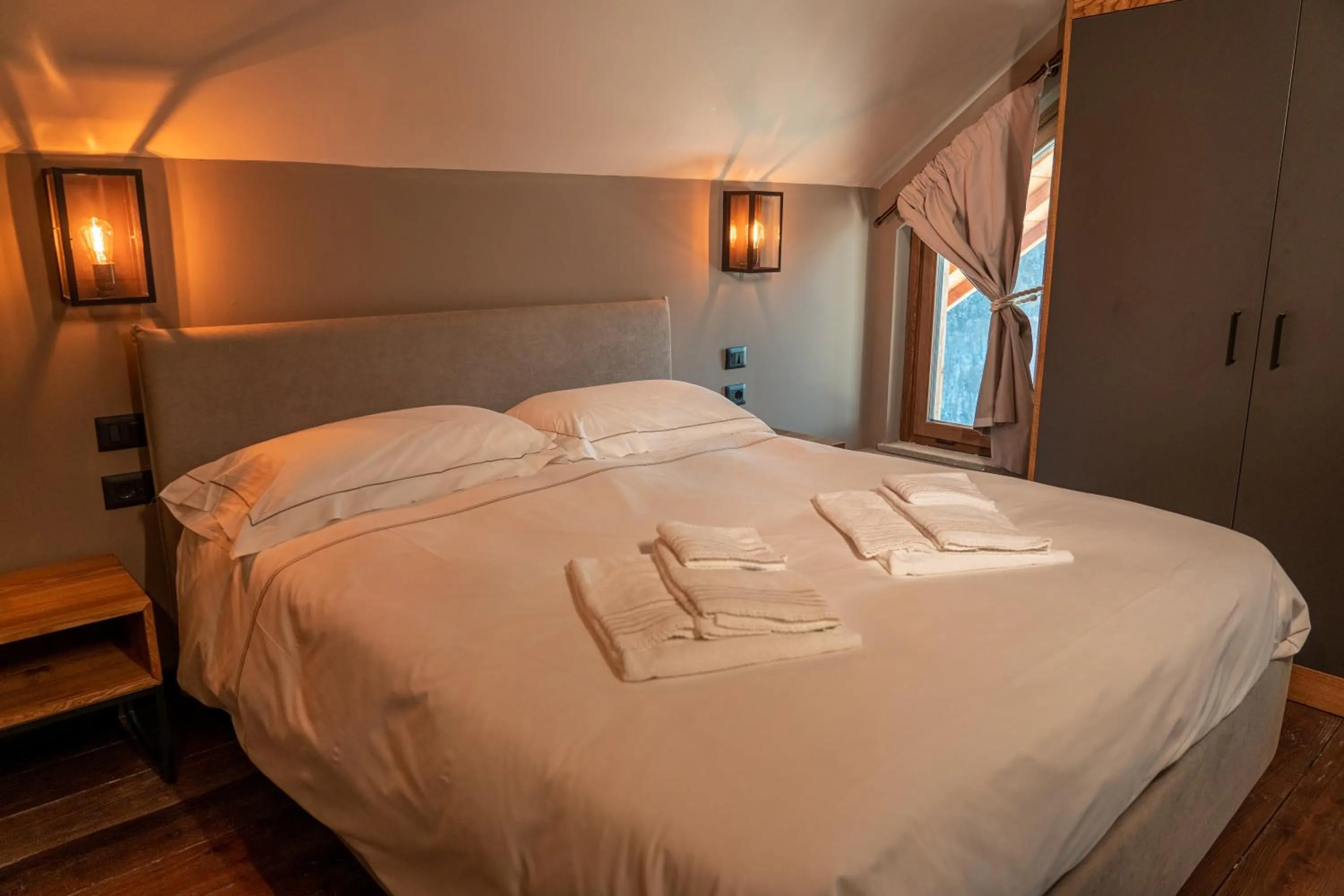 Bed in Chalet Everest - Luxury Apartments