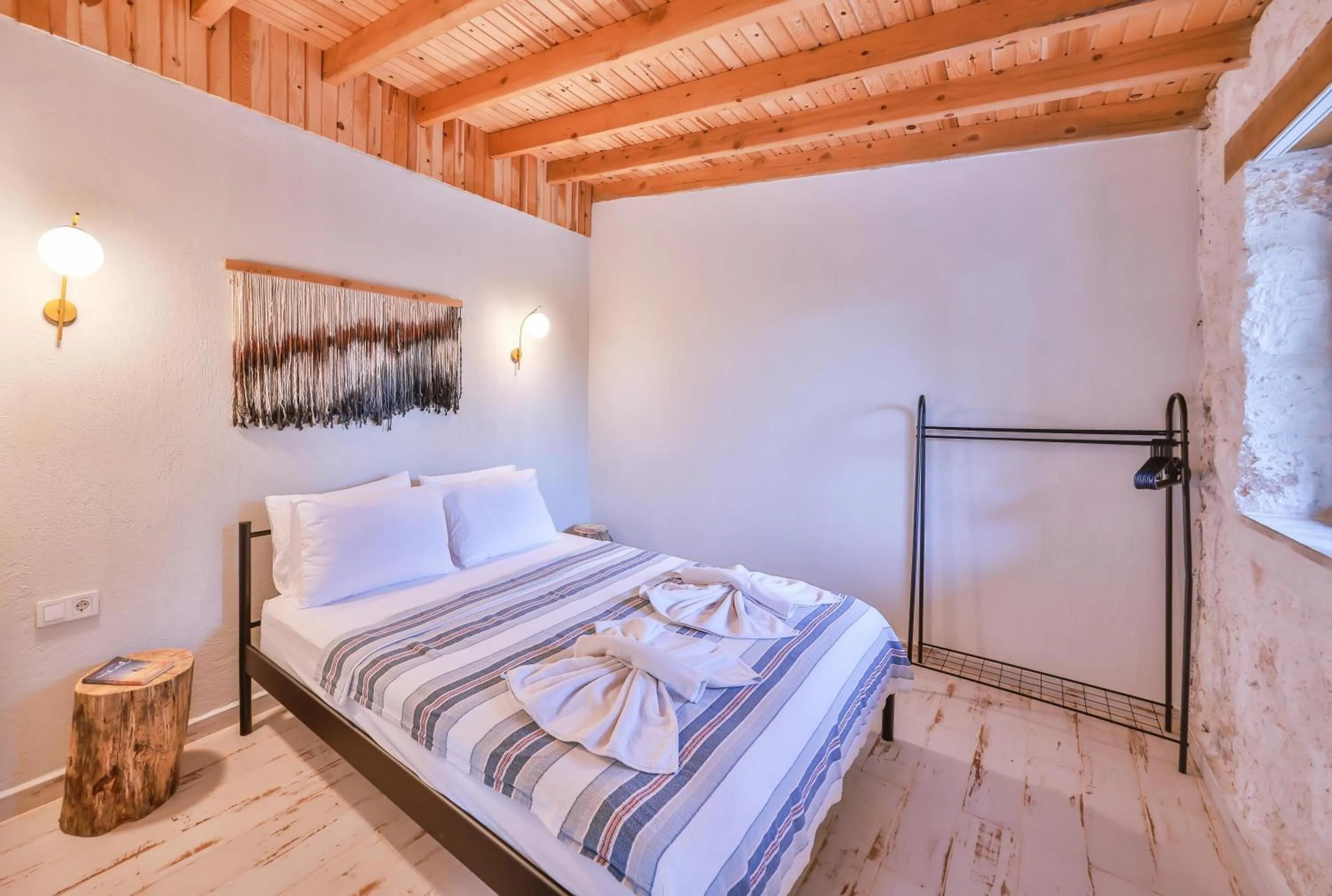 Bed in Bademlique Stone Rooms