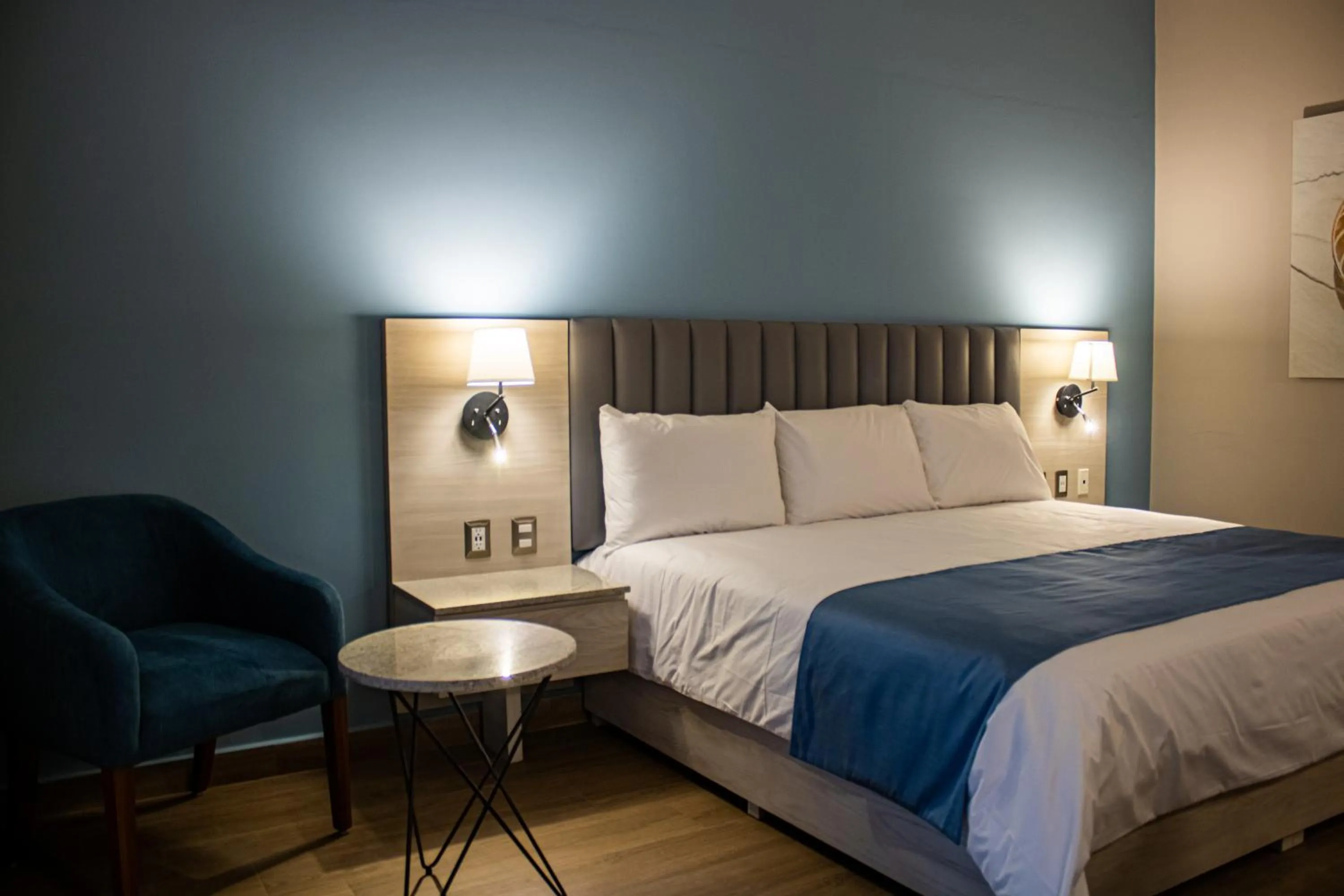 Bed in Varali Grand Hotel