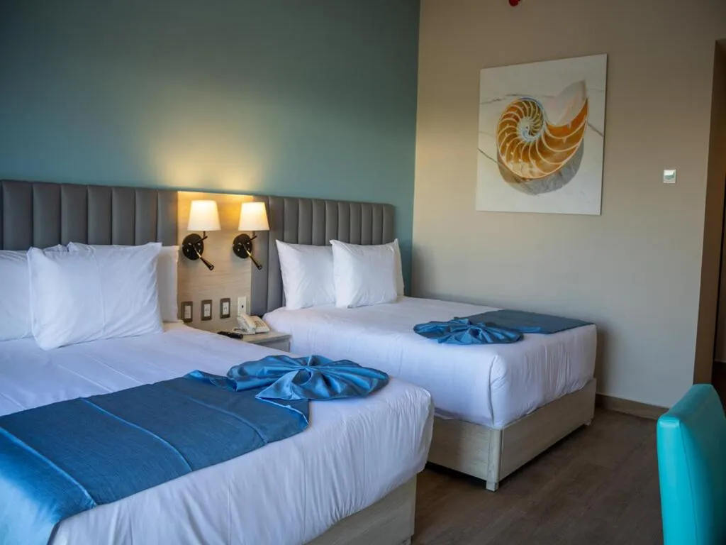 Bed in Varali Grand Hotel