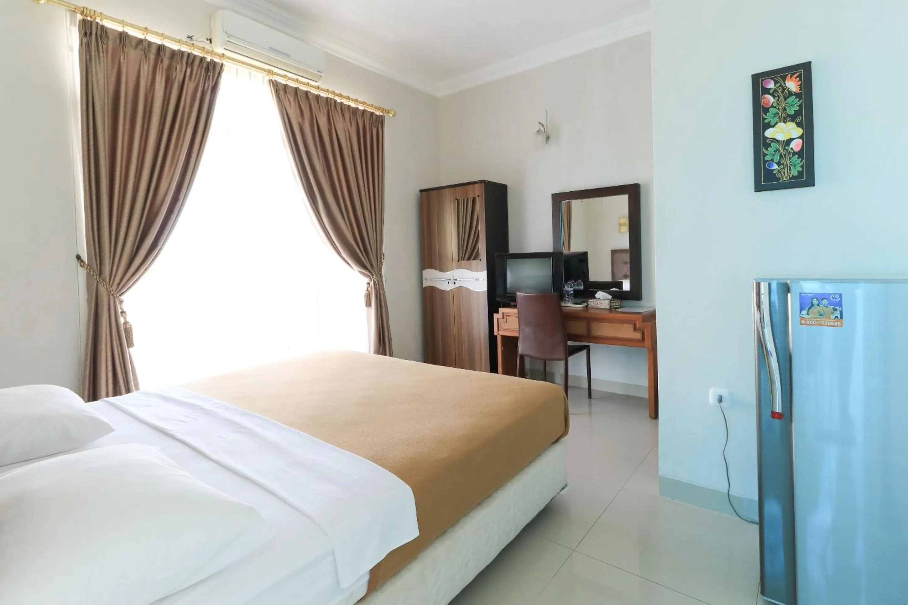 Photo of the whole room, Bed in Ge JacMart Homestay Makassar