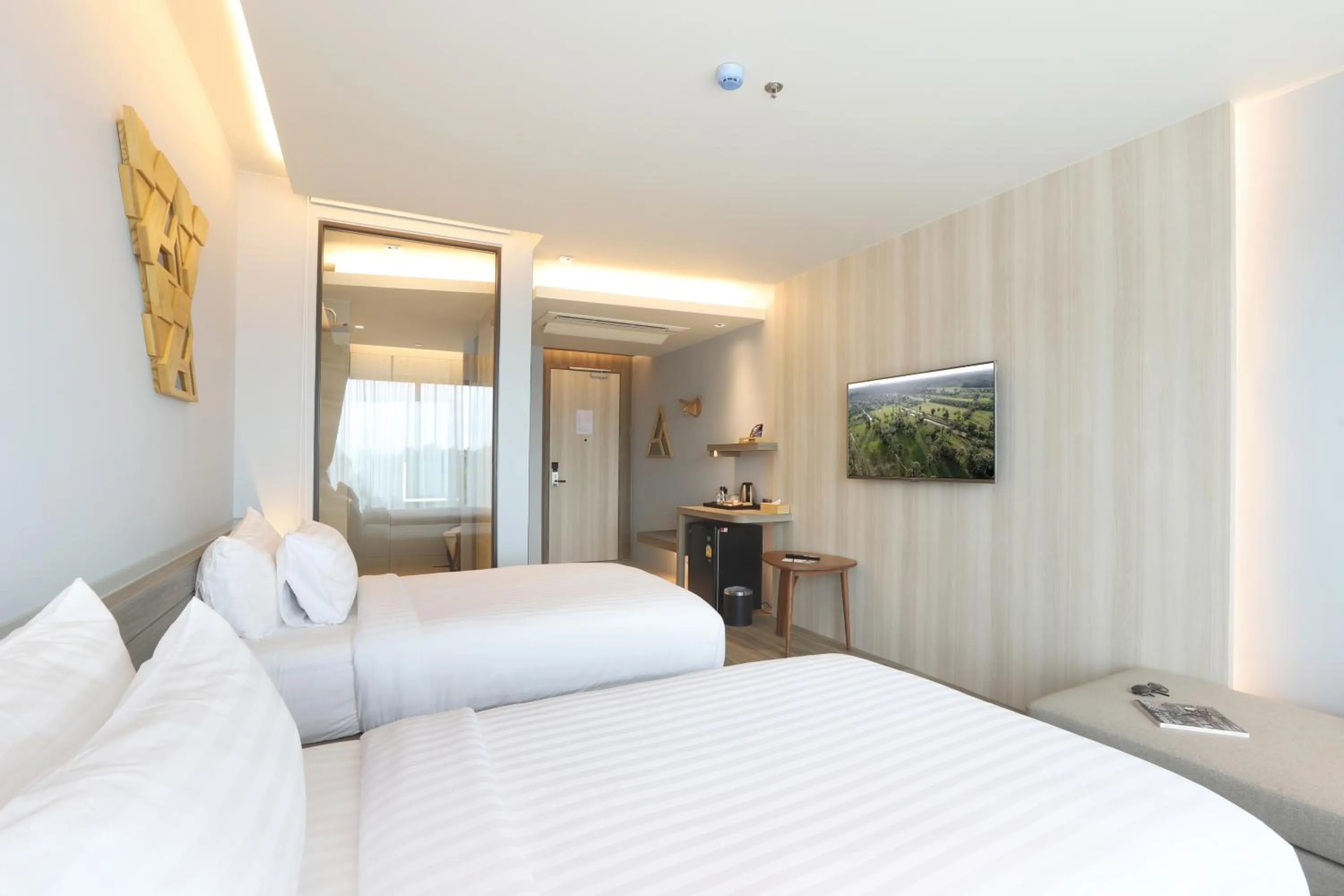 Bed in The Signature Hotel Airport