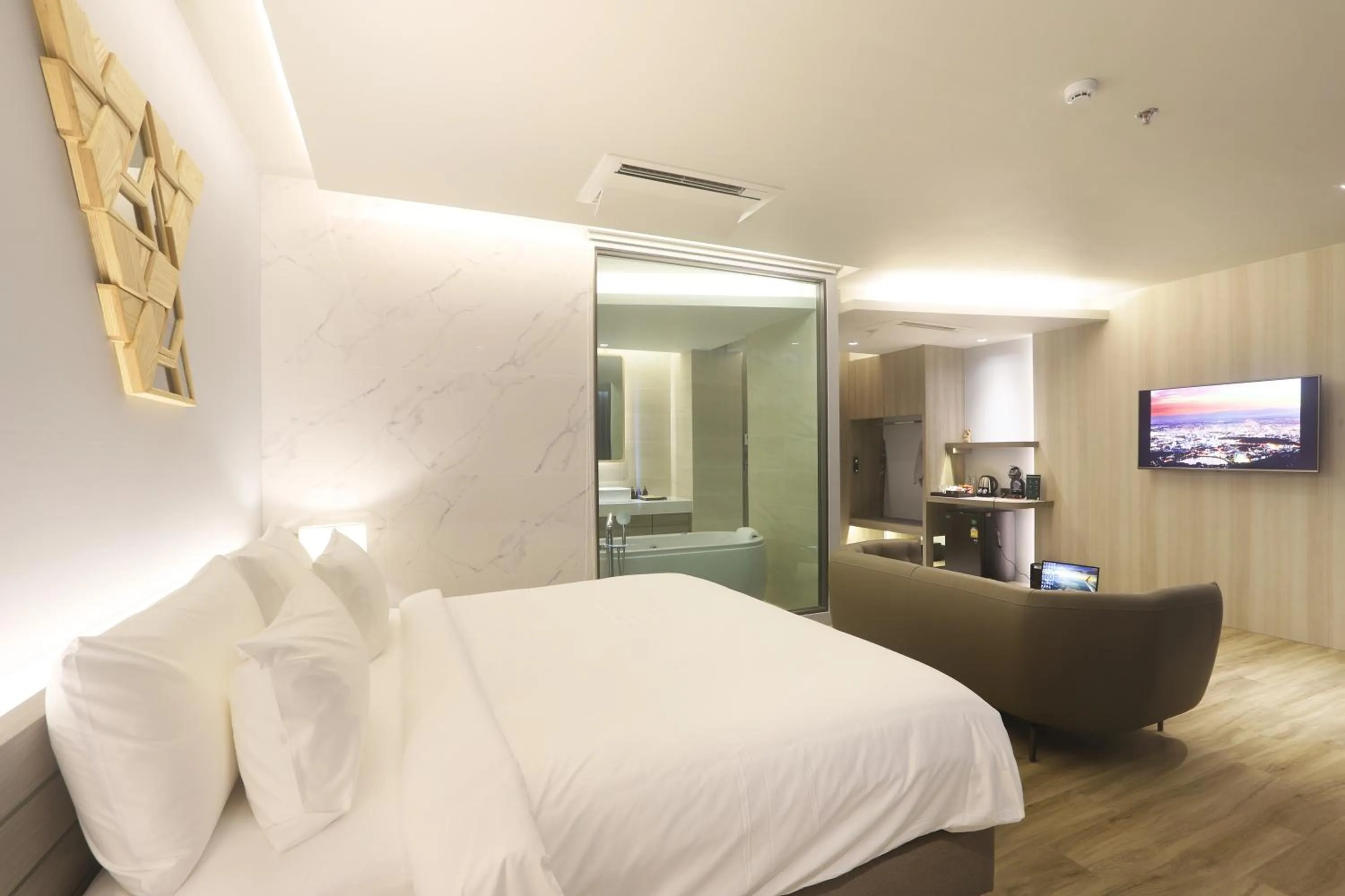 Bed in The Signature Hotel Airport